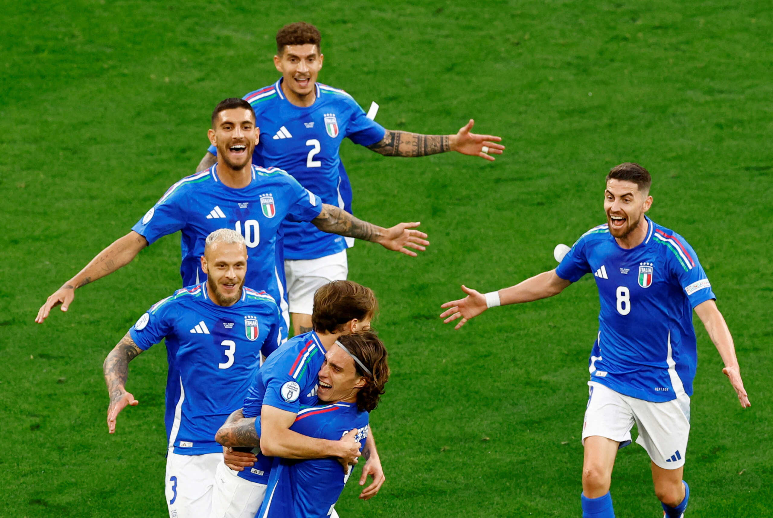 Soccer Football - Euro 2024 - Group B - Italy v Albania - Dortmund BVB Stadion, Dortmund, Germany - June 15, 2024 Italy's Nicolo Barella celebrates scoring their second goal with Riccardo Calafiori and teammates REUTERS