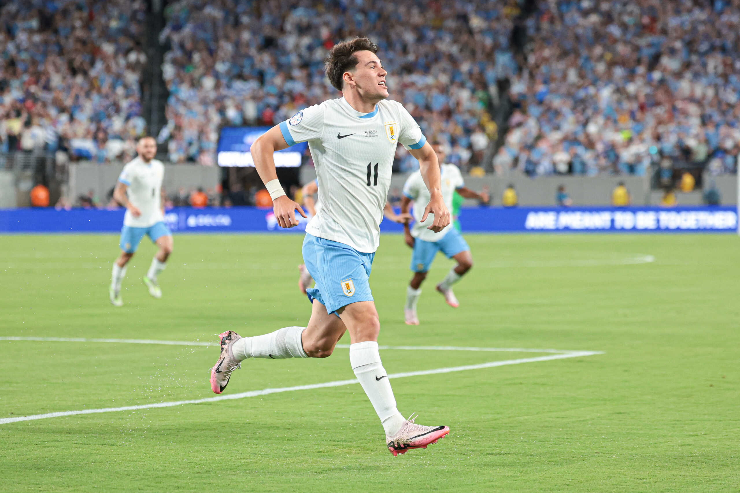 Jun 27, 2024; East Rutherford, NJ, USA; Uruguay midfielder Facundo Pellistri (11) celebrates his goal during the first half of the Copa America match against Bolivia at MetLife Stadium. Mandatory Credit: Vincent Carchietta-USA TODAY Sports