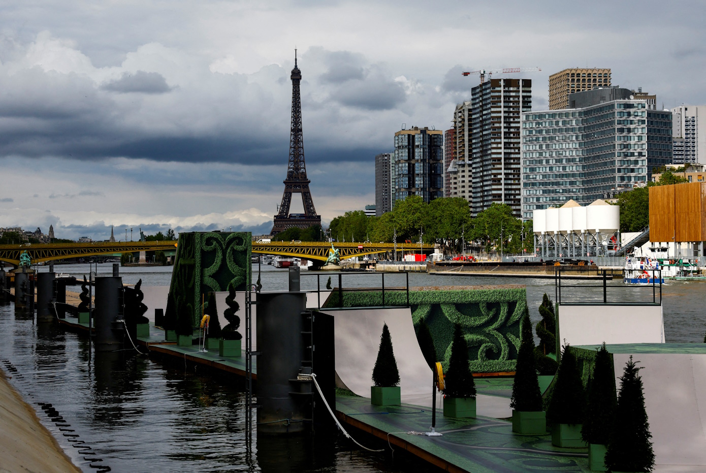 A floating skate park is seen at the River Seine near the Eiffel Tower on a rainy day ahead of the Paris 2024 Olympics and Paralympics Games in Paris, France, July 12, 2024. REUTERS