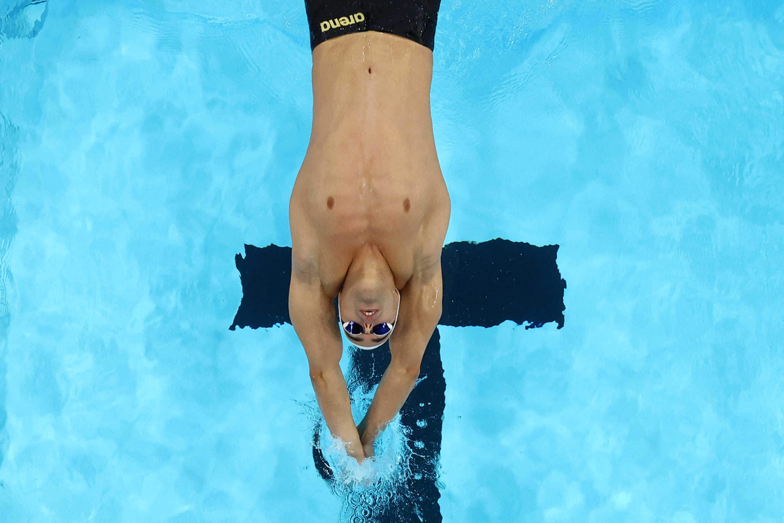 Paris 2024 Olympics - Swimming - Men's 100m Backstroke - Heats - Paris La Defense Arena, Nanterre, France - July 28, 2024.  Apostolos Christou of Greece in action. REUTERS