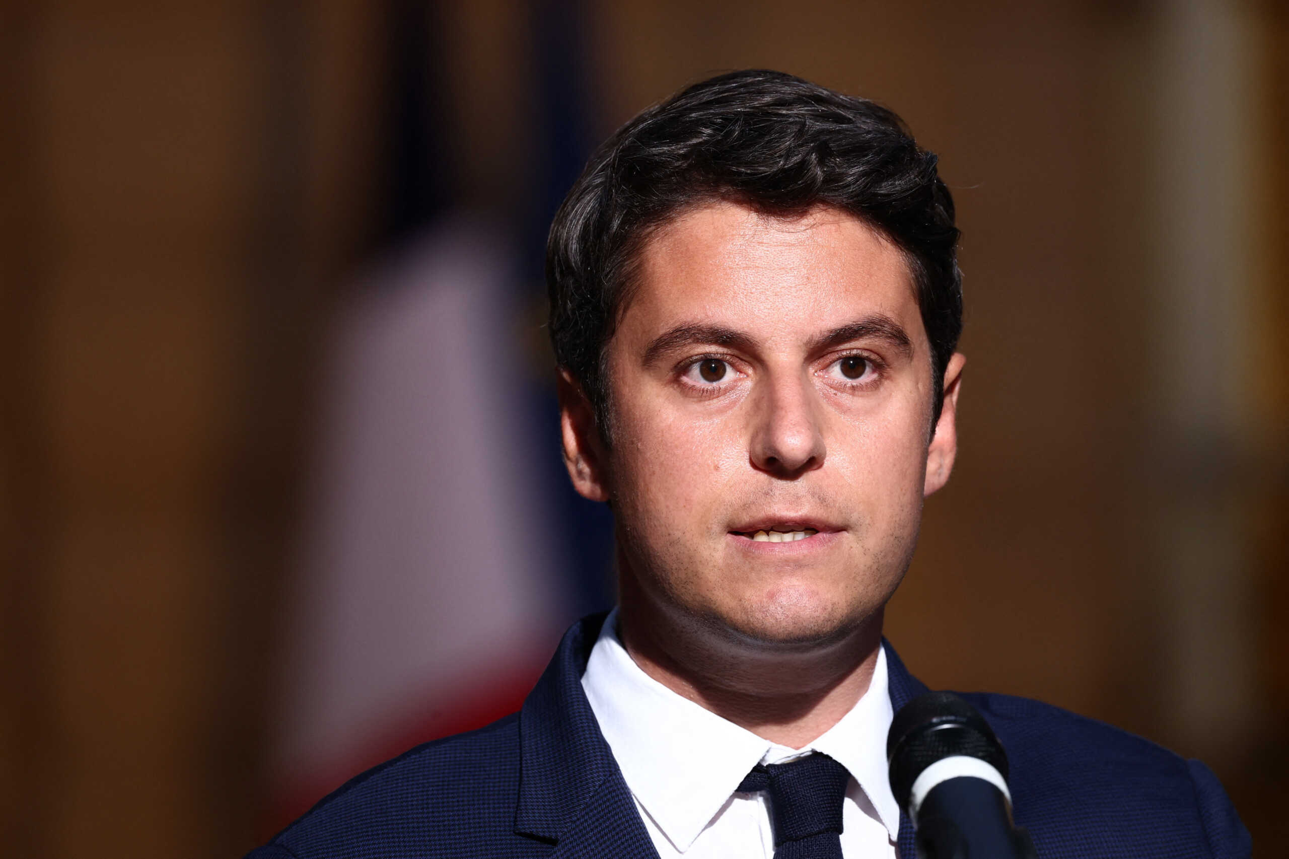 Gabriel Attal, French Prime Minister and French presidential majority group "Ensemble pour la Republique" candidate, delivers a speech after partial results in the first round of the early French parliamentary elections, at Hotel Matignon in Paris, France, June 30, 2024. REUTERS