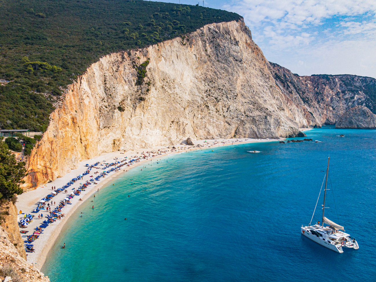 People on famous Porto Katsiki beach on southwest part of Lefkada (Levkas) island, Ionian sea, Greece.