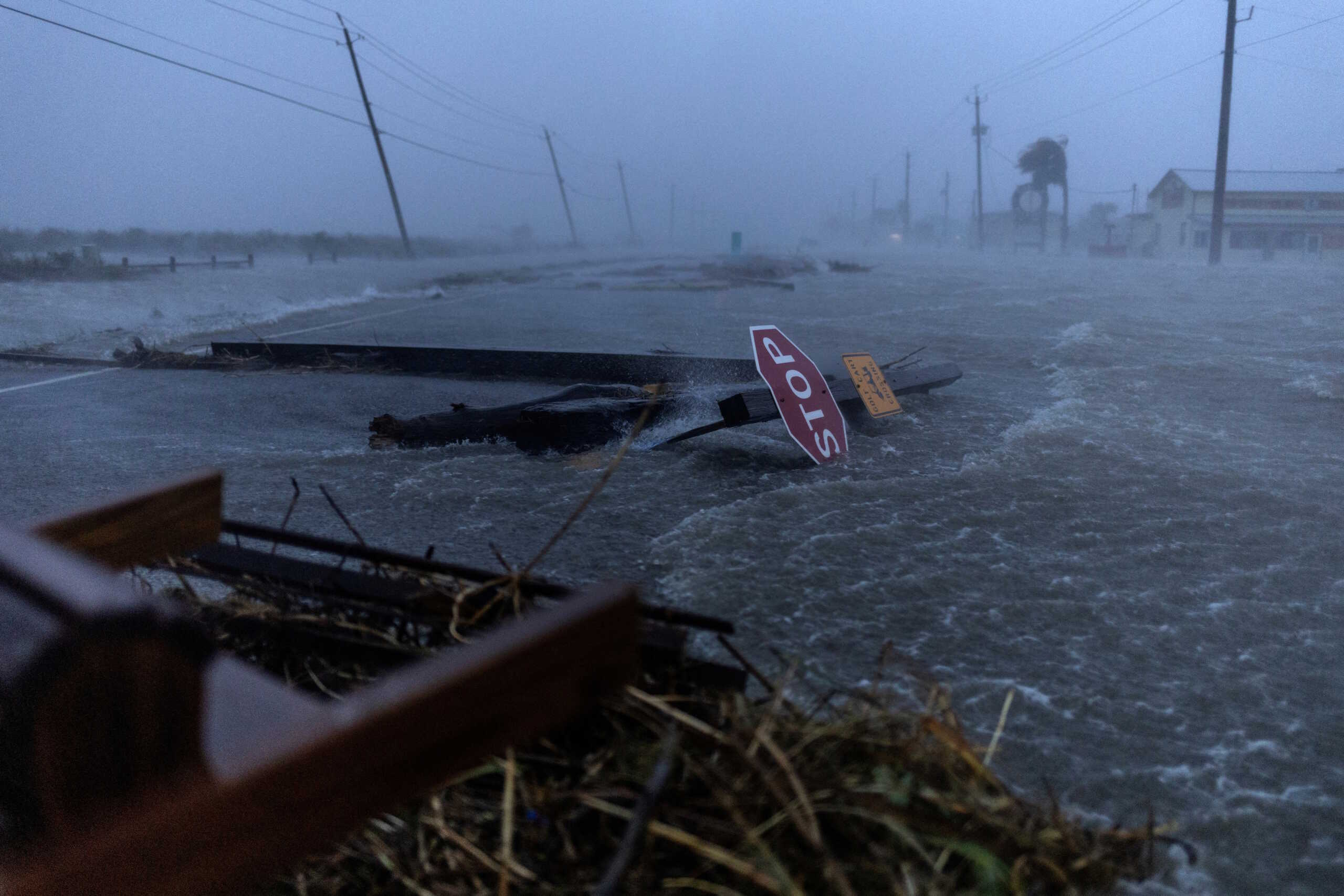 Debris and flood waters from Hurricane Beryl cover the main roadway in Surfside Beach, Texas, U.S., July 8, 2024.  REUTERS