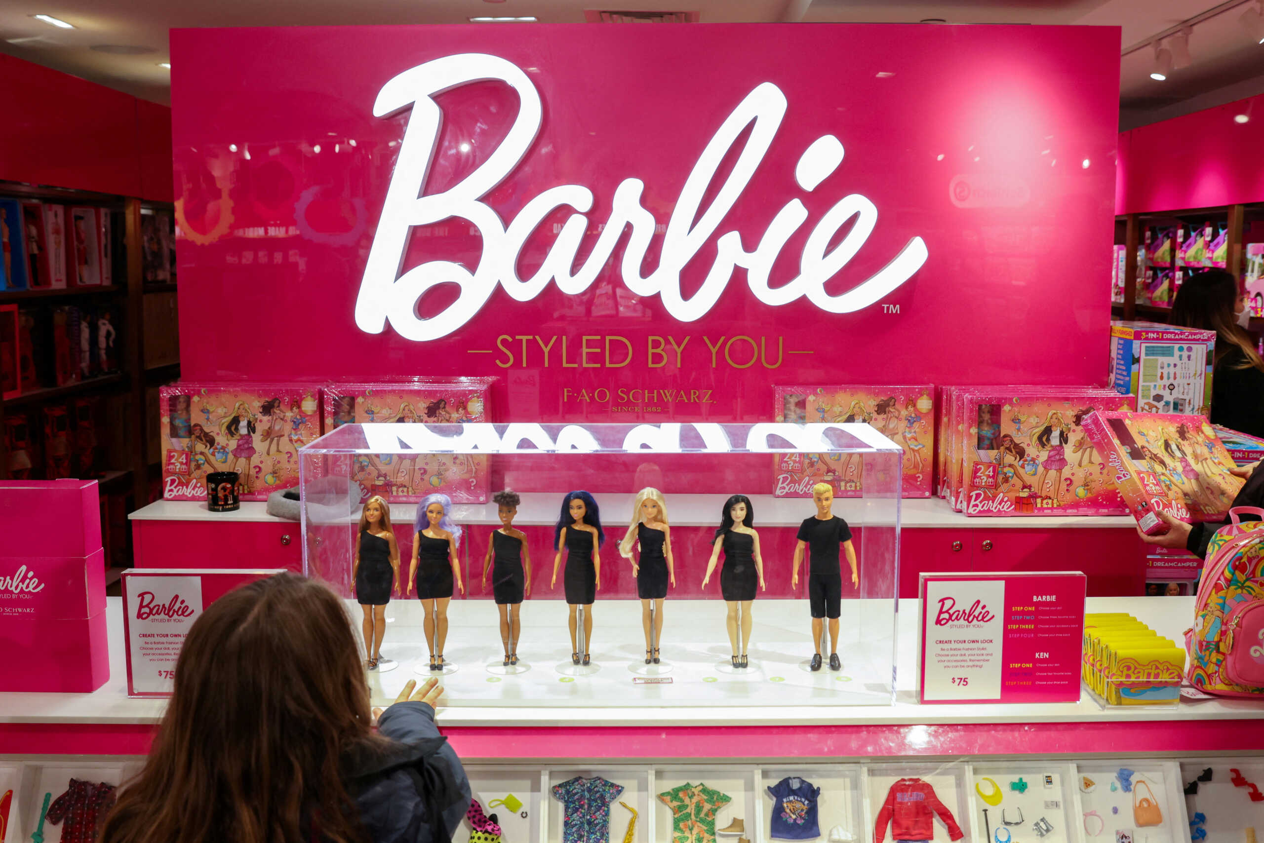 FILE PHOTO: Barbie dolls, a brand owned by Mattel, are seen at the FAO Schwarz toy store in Manhattan, New York City, U.S., November 24, 2021. REUTERS