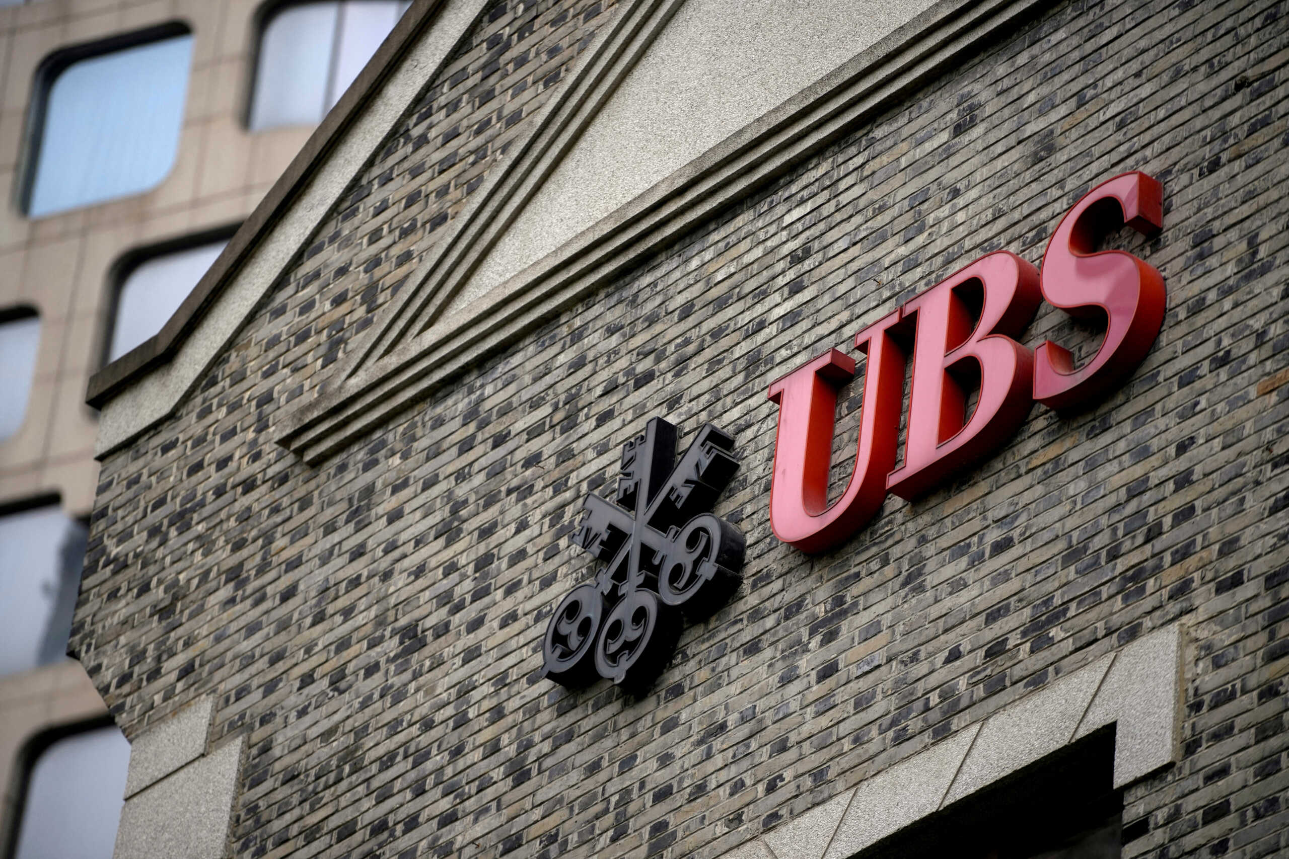 FILE PHOTO: The logo of Swiss bank UBS is seen at the bank's branch in Shanghai, China, March 20, 2023. REUTERS