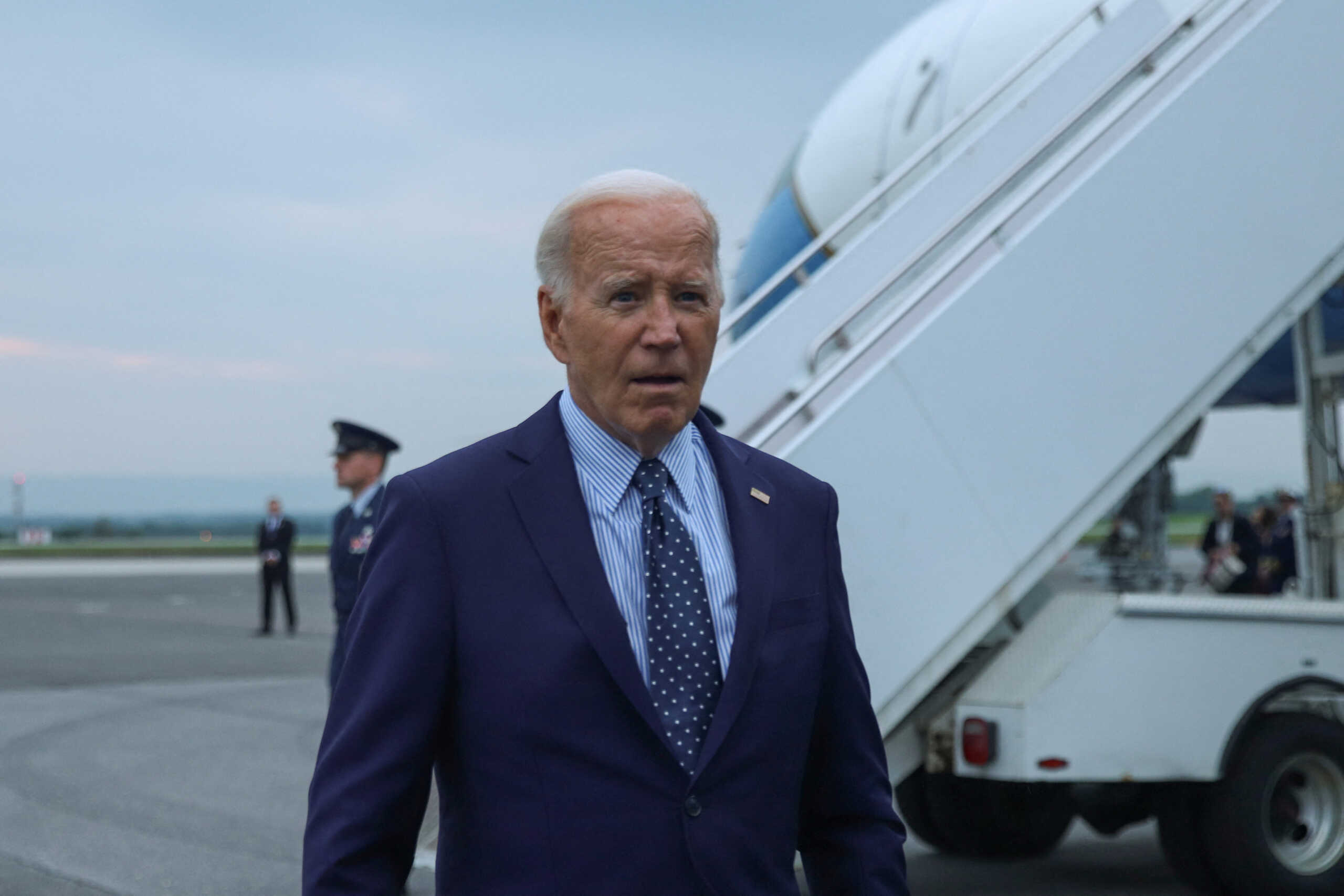 U.S. President Joe Biden walks on the tarmac as he departs for Camp David, at Hagerstown Regional Airport in Hagerstown, Maryland, U.S., August 16, 2024. REUTERS