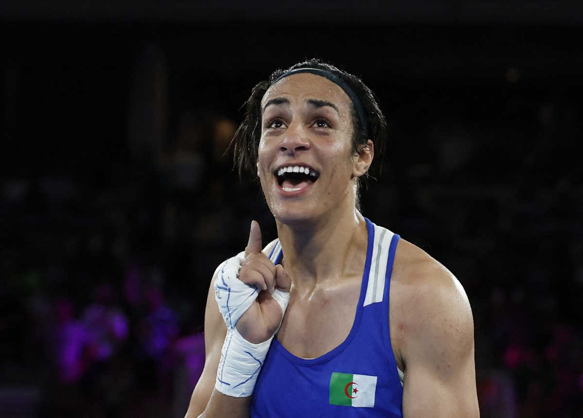 Paris 2024 Olympics - Boxing - Women's 66kg - Semifinal - Roland-Garros Stadium, Paris, France - August 06, 2024. Imane Khelif of Algeria reacts after winning her fight against Janjaem Suwannapheng of Thailand. REUTERS