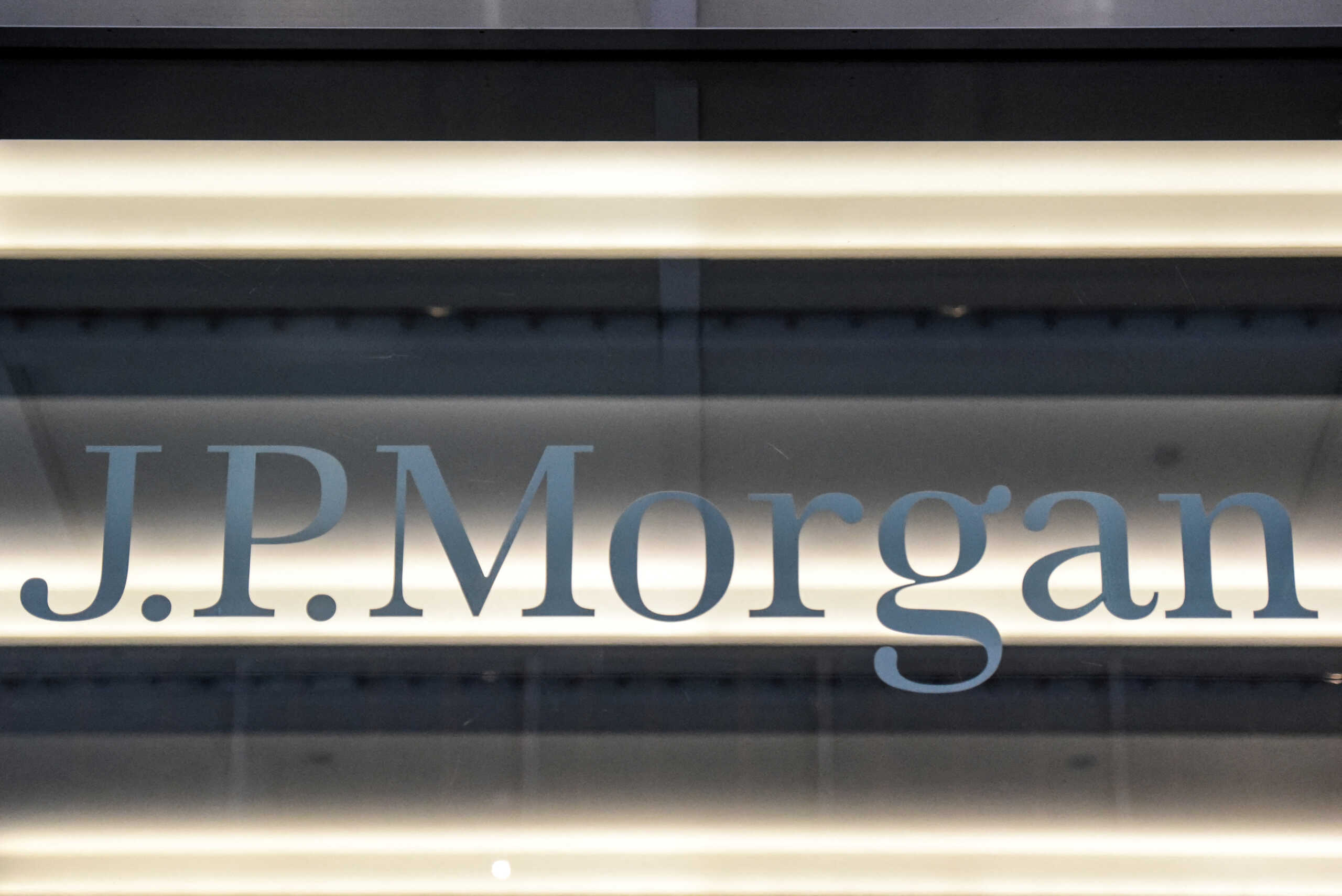 FILE PHOTO: A J.P. Morgan logo is seen in New York City, U.S. January 10, 2017. REUTERS