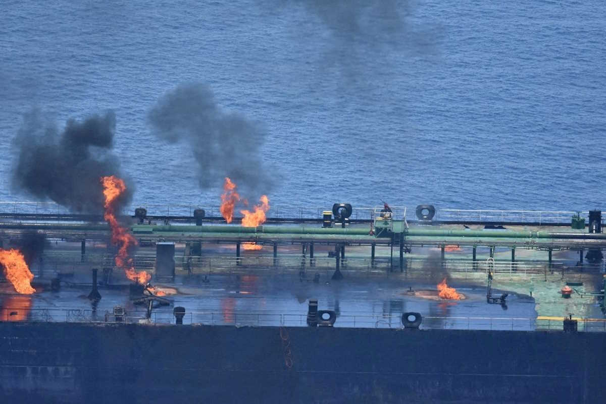 FILE PHOTO: Flames and smoke rise from the Greek-flagged oil tanker Sounion, which has been on fire since August 23, on the Red Sea, August 25, 2024. Yemen's Houthis said they attacked the Sounion in the Red Sea. EUNAVFOR ASPIDES