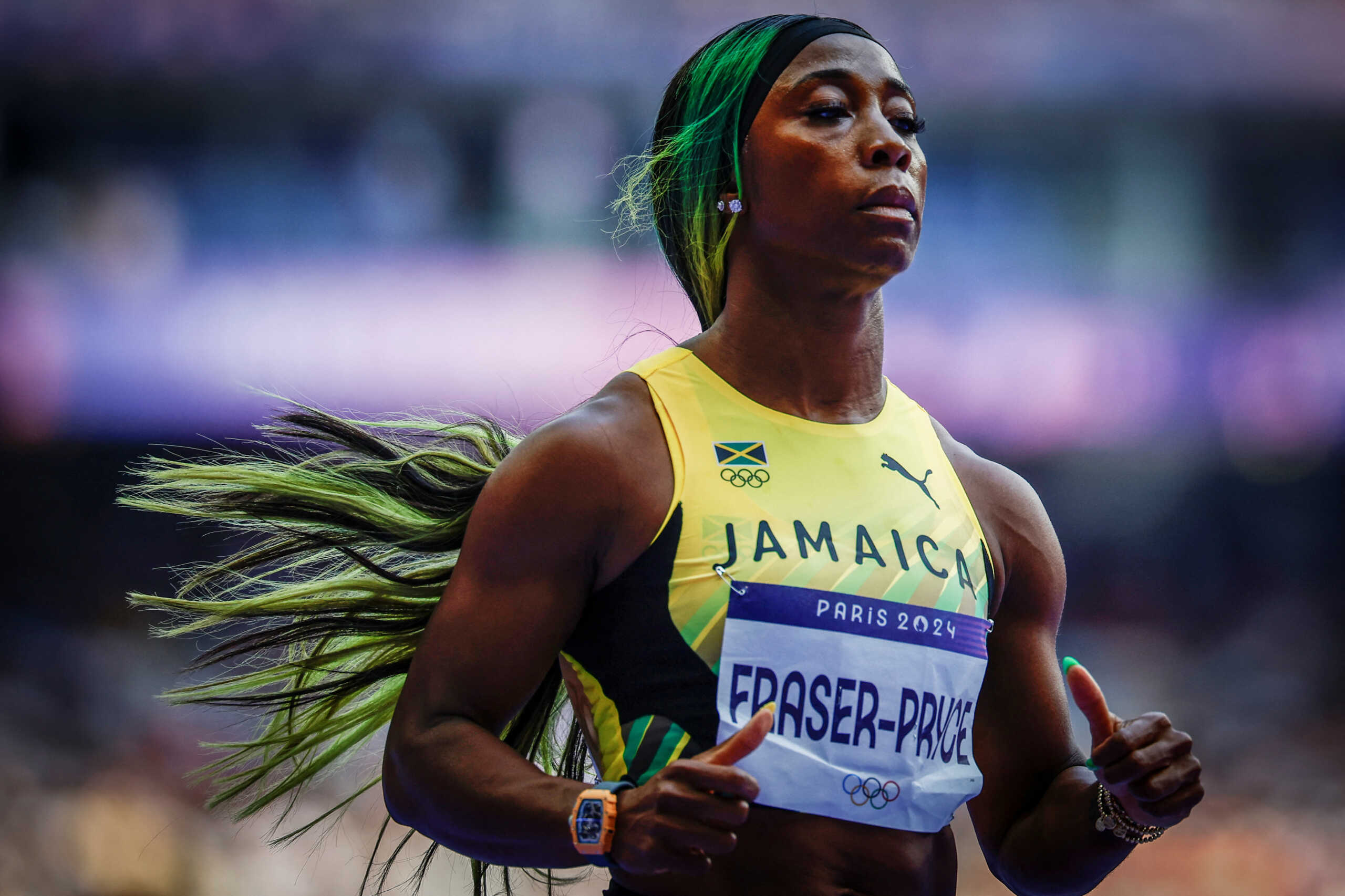 FILE PHOTO: Paris 2024 Olympics - Athletics - Women's 100m Round 1 - Stade de France, Saint-Denis, France - August 02, 2024. Shelly-Ann Fraser-Pryce of Jamaica reacts after the heats. REUTERS