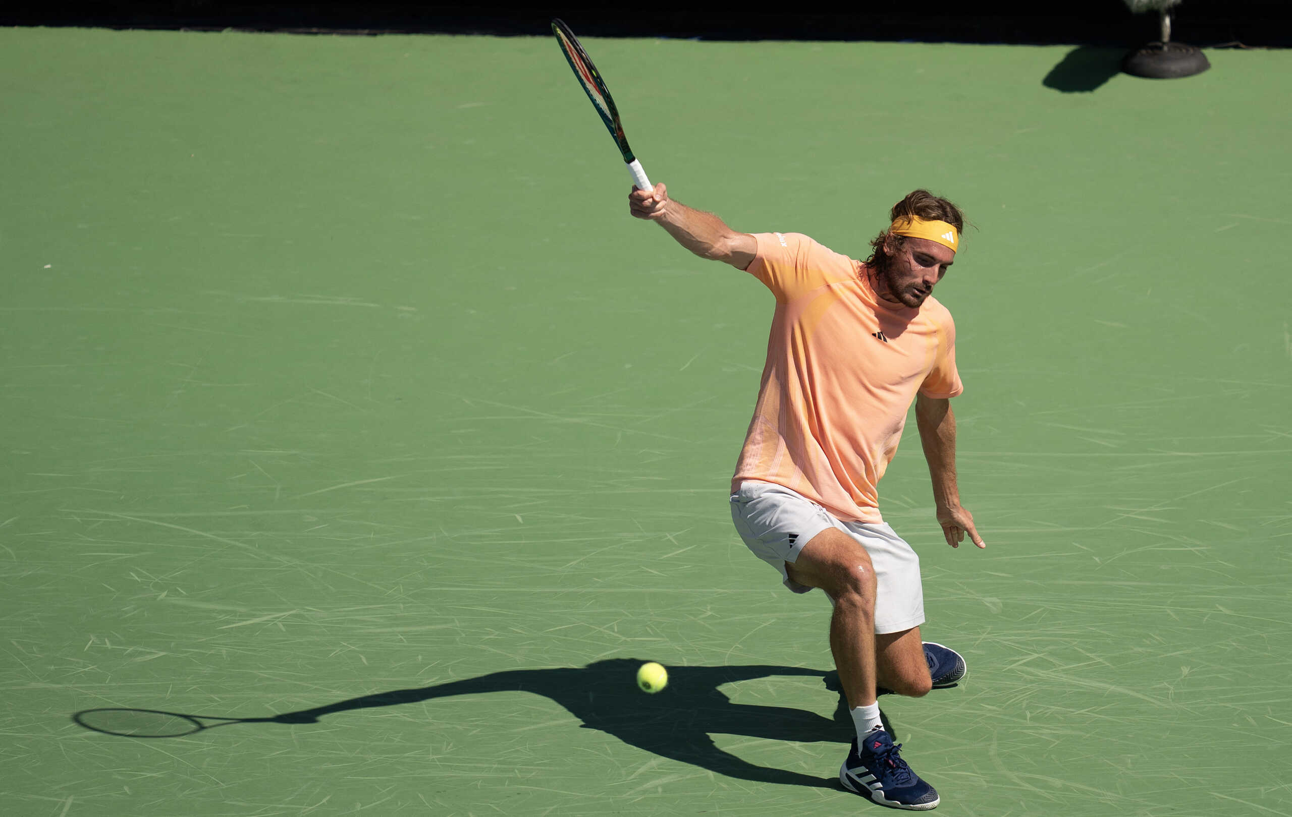 Aug 14, 2024; Cincinnati, OH, USA; Stefanos Tsitsipas of Greece returns a shot against Jan-Lennard Struff of Germany on day three of the Cincinnati Open. Mandatory Credit: Susan Mullane-USA TODAY Sports