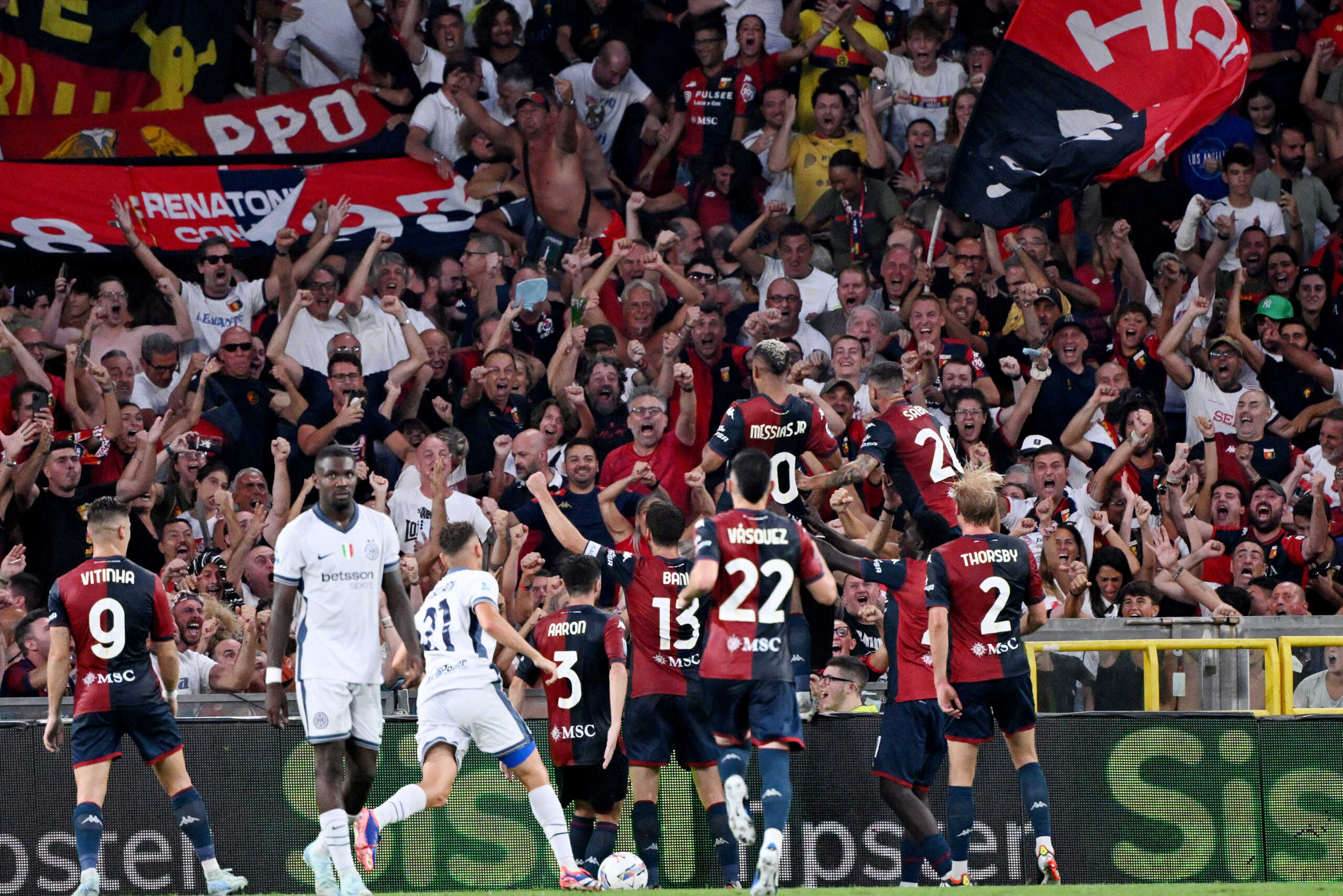 Soccer Football - Serie A - Genoa v Inter Milan - Stadio Comunale Luigi Ferraris, Genoa, Italy - August 17, 2024 Genoa's Junior Messias celebrates scoring their second goal with teammates in front of their fans REUTERS