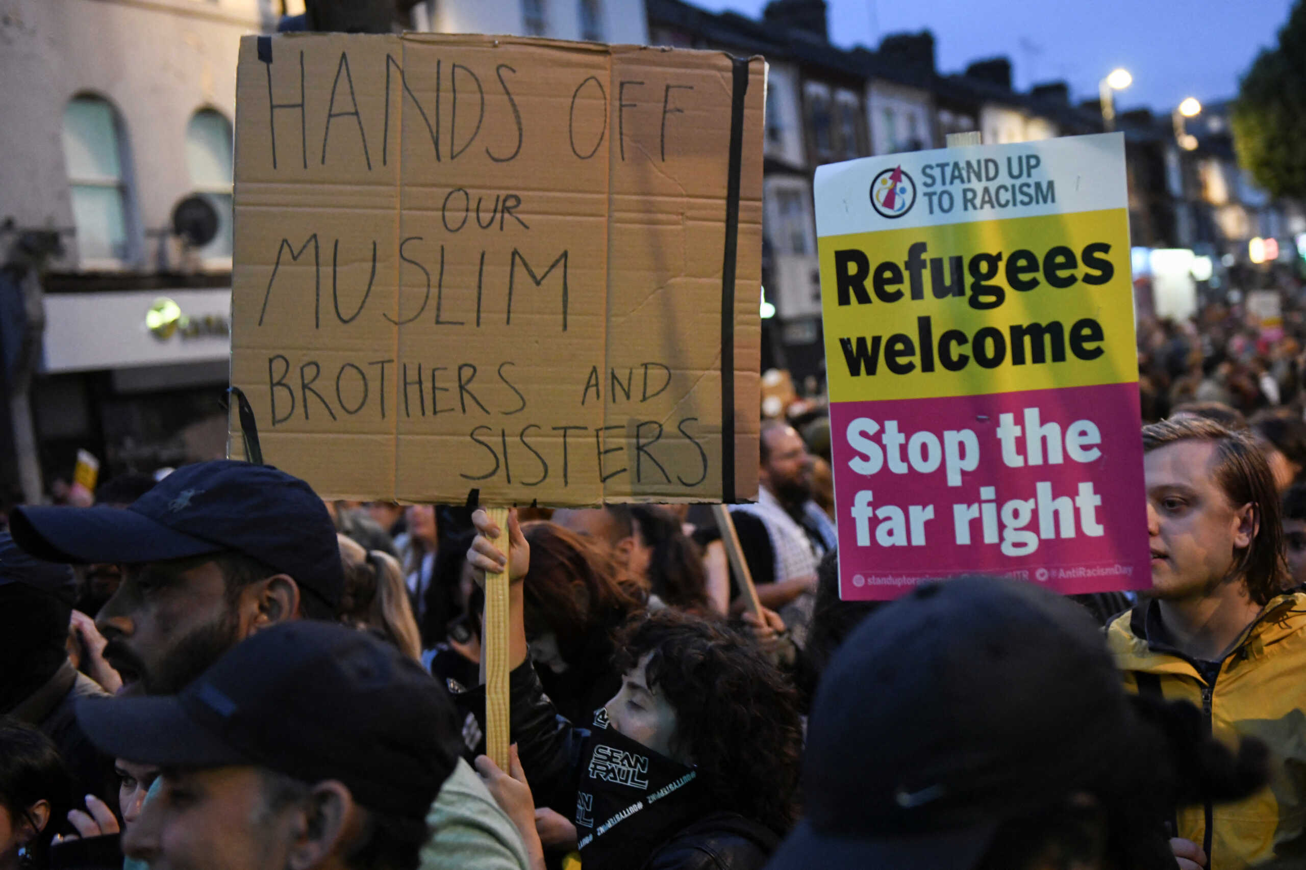 People gather against an an anti-immigration protest, in London, Britain, August 7, 2024. REUTERS