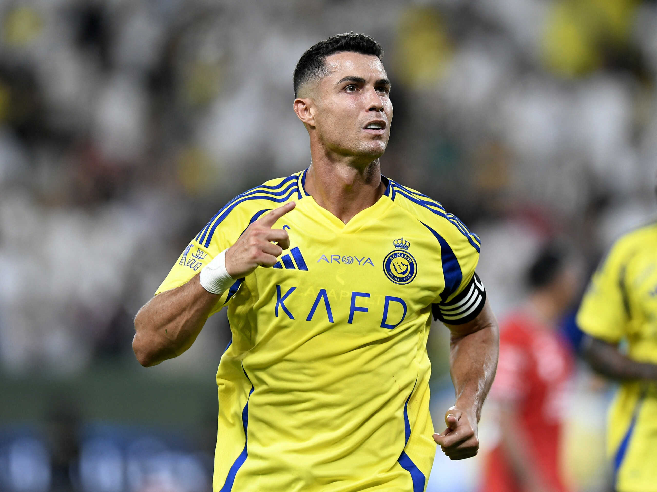 Soccer Football - Saudi Pro League - Al Nassr v Al Raed - Al-Awwal Stadium, Riyadh, Saudi Arabia - August 22, 2024 Al Nassr's Cristiano Ronaldo celebrates scoring their second goal REUTERS