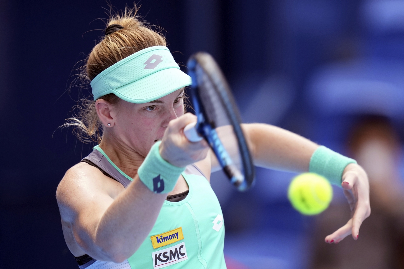 Despina Papamichail of Greece returns a shot against Garbine Muguruza of Spain during a singles match in the Pan Pacific Open tennis tournament at Ariake Colosseum Wednesday, Sept. 21, 2022, in Tokyo. (AP Photo