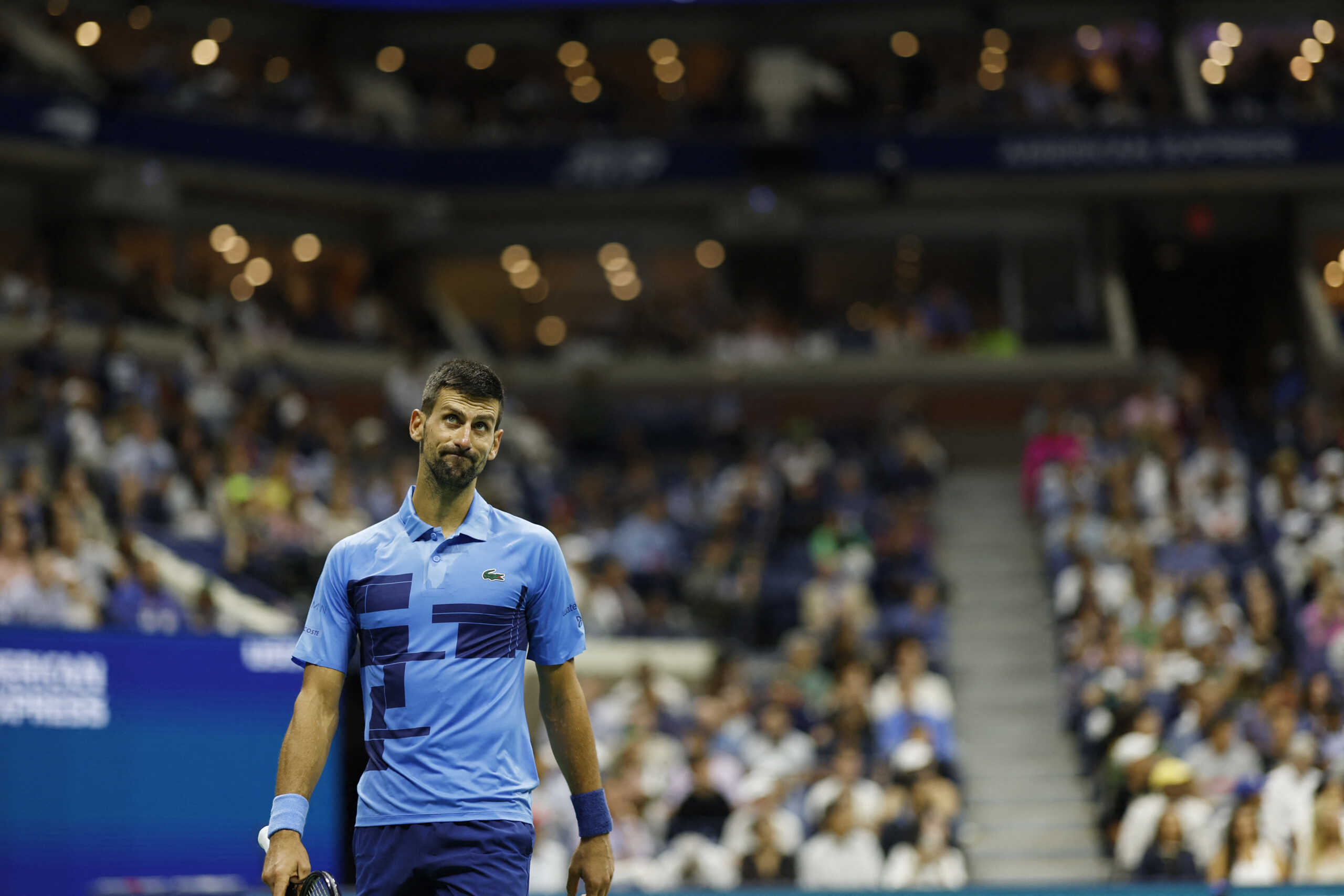 Aug 30, 2024; Flushing, NY, USA; Novak Djokovic (SRB) looks at a replay between points against Alexei Popyrin (AUS)(not pictured) in a men's singles match on day five of the 2024 U.S. Open tennis tournament at Billie Jean King USTA National Tennis Center. Mandatory Credit: Geoff Burke-USA TODAY Sports