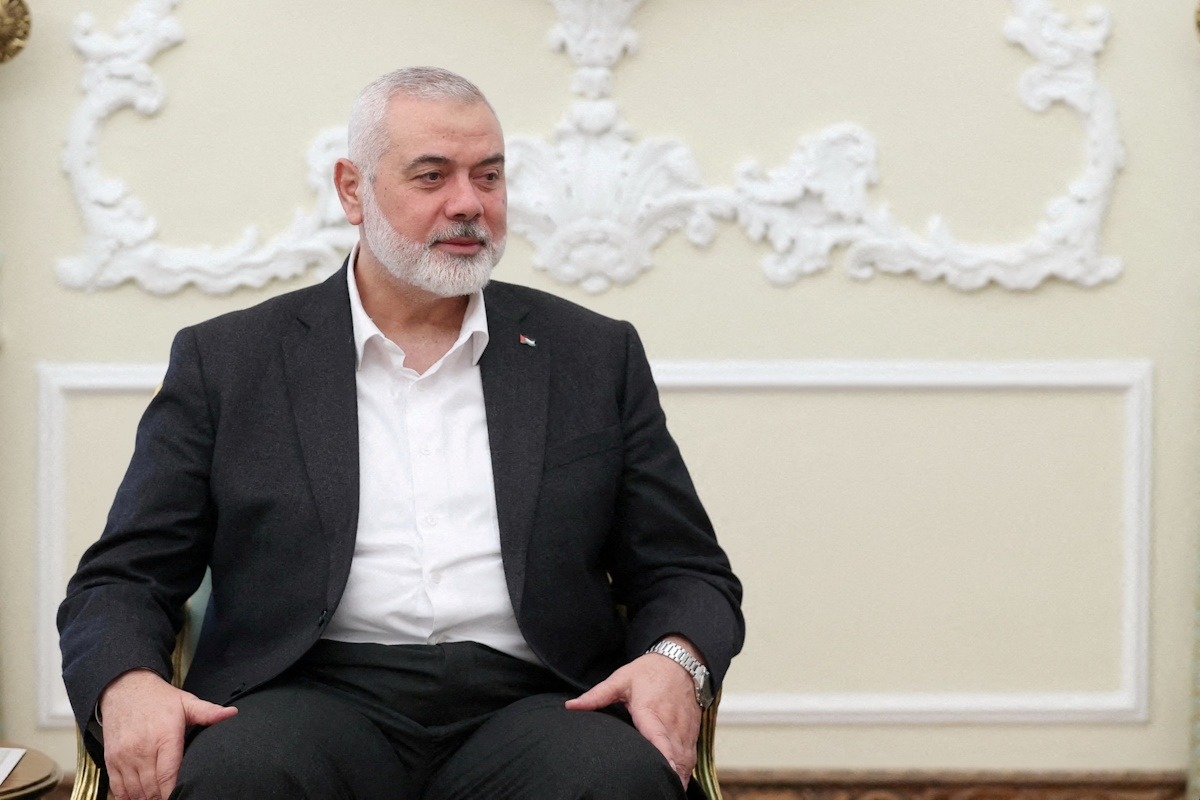 FILE PHOTO: Palestinian group Hamas' top leader, Ismail Haniyeh meets with Iranian President Ebrahim Raisi (not pictured) in Tehran, Iran March 27, 2024. Iran's Presidency