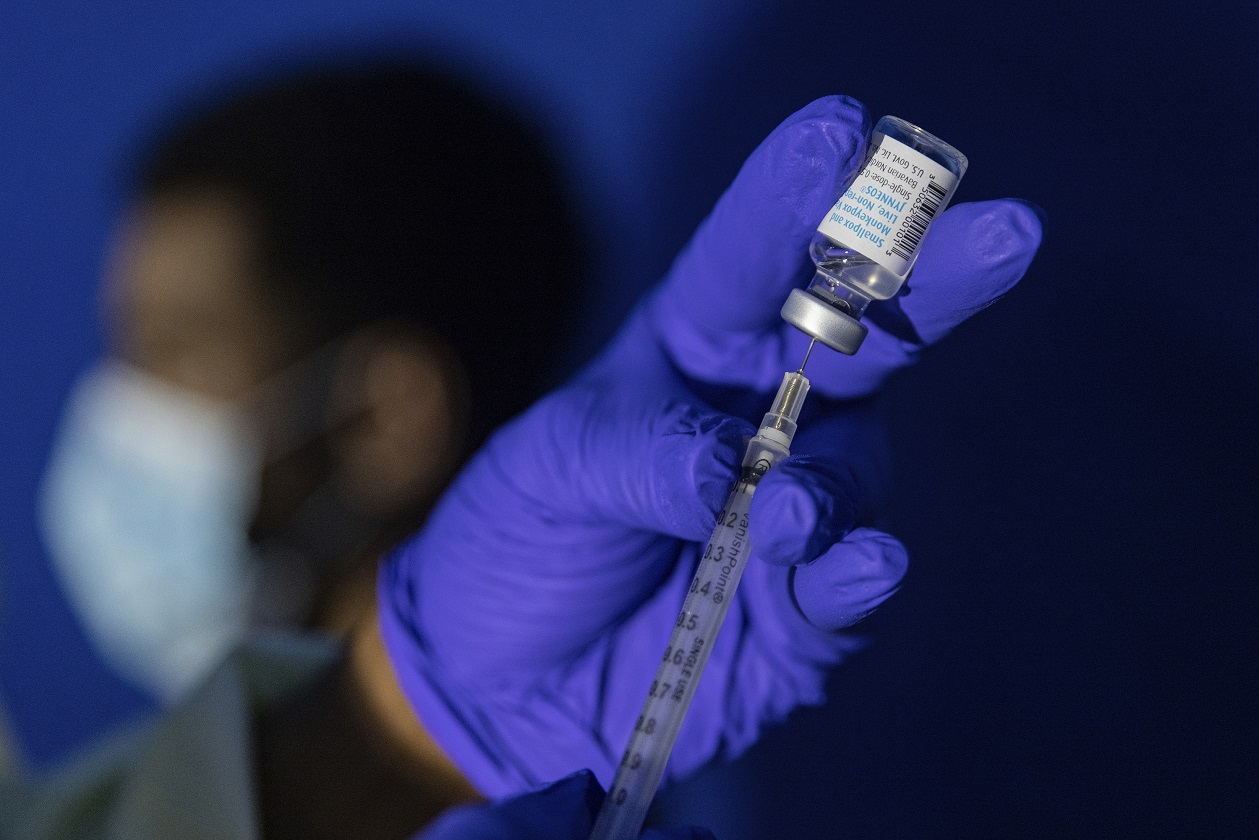 FILE - Family nurse practitioner Carol Ramsubhag-Carela prepares a syringe with the Mpox vaccine before inoculating a patient at a vaccinations site on Tuesday, Aug. 30, 2022, in the Brooklyn borough of New York. Africa's public health body said Thursday, Feb. 16, 2023 it hopes Mpox vaccines will finally arrive on the continent "in another two weeks, tops" after months of seeking doses. (AP Photo