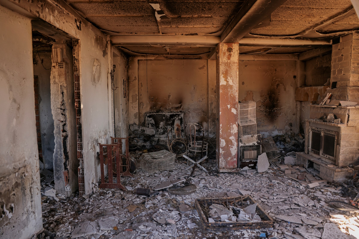 A view shows the destroyed interior of the house of Sakis Morfis, 70, following a wildfire in Vrilissia, near Athens, Greece, August 13, 2024. REUTERS