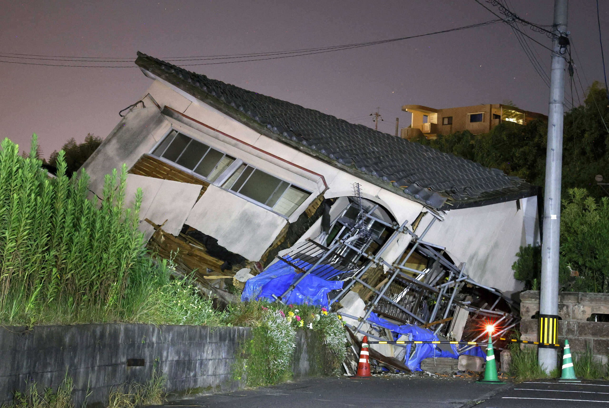 A collapsed house is seen following an earthquake in Osaki town, Kagoshima prefecture, southwestern Japan, August 8, 2024, in this photo taken by Kyodo. Mandatory credit Kyodo