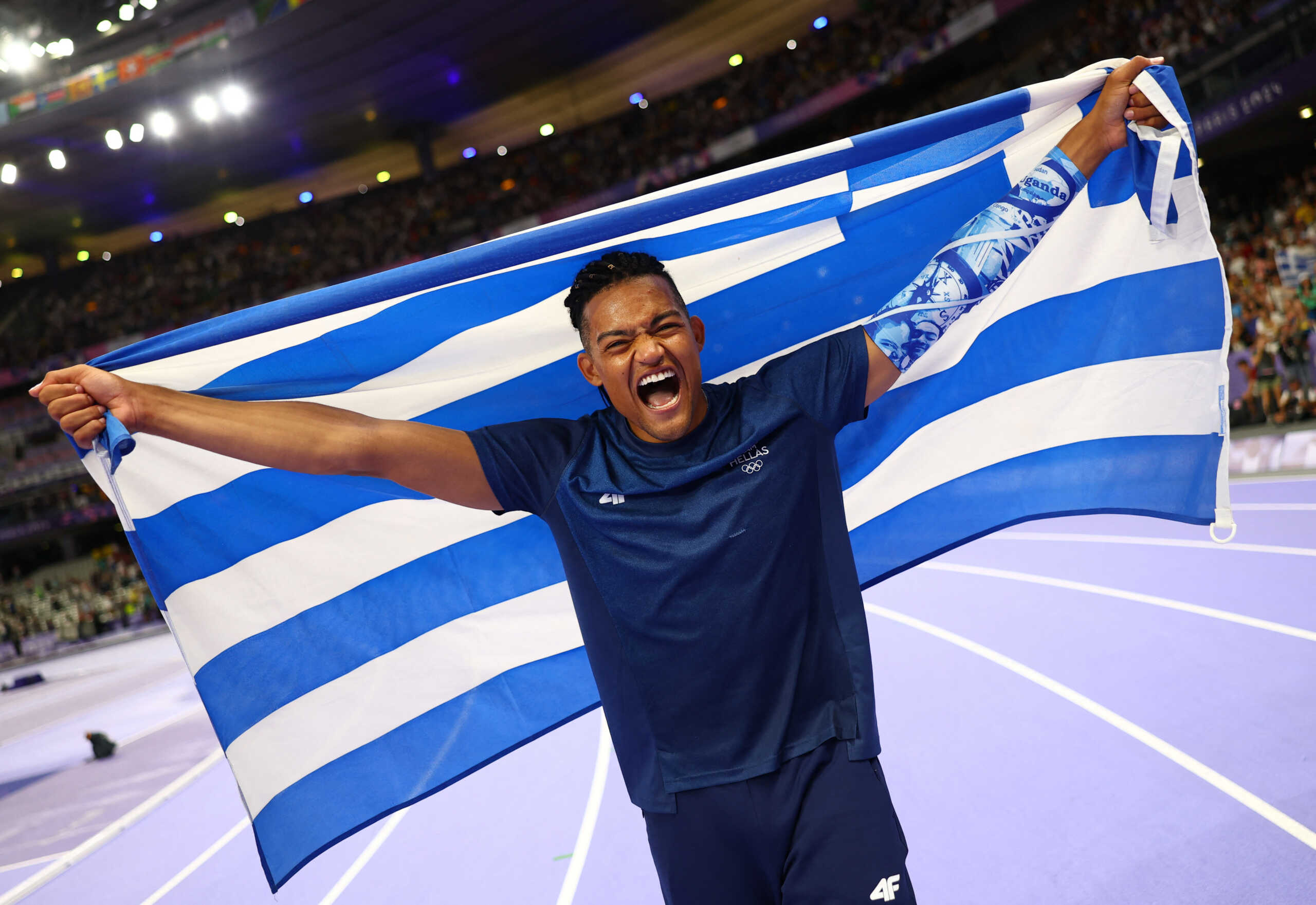 Paris 2024 Olympics - Athletics - Men's Pole Vault Final - Stade de France, Saint-Denis, France - August 05, 2024. Bronze medallist Emmanouil Karalis of Greece celebrates after the final. REUTERS