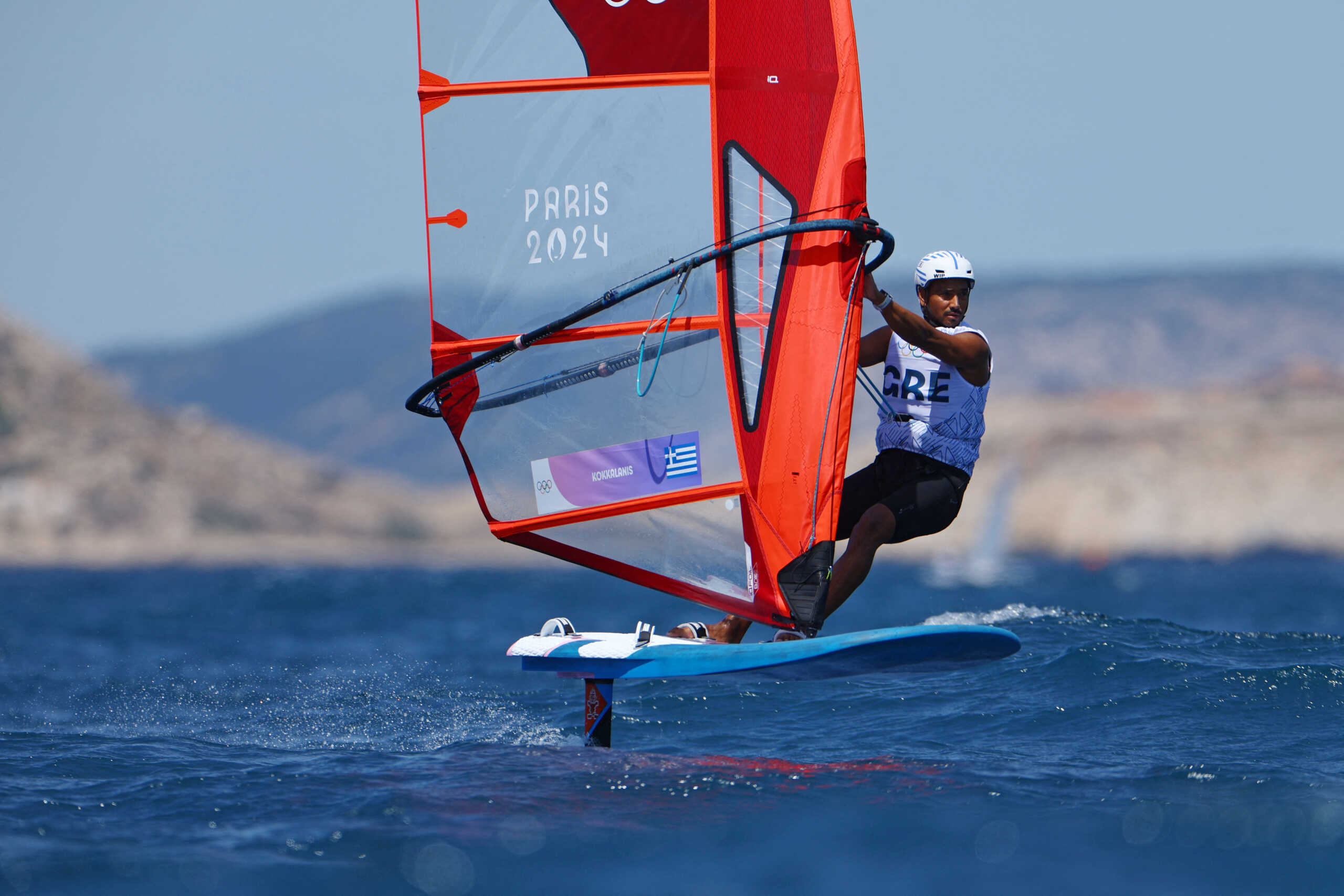 Paris 2024 Olympics - Sailing Training - Marseille Marina, Marseille, France - July 24, 2024. Vyron Kokkalanis of Greece in action during windsurfing training. REUTERS