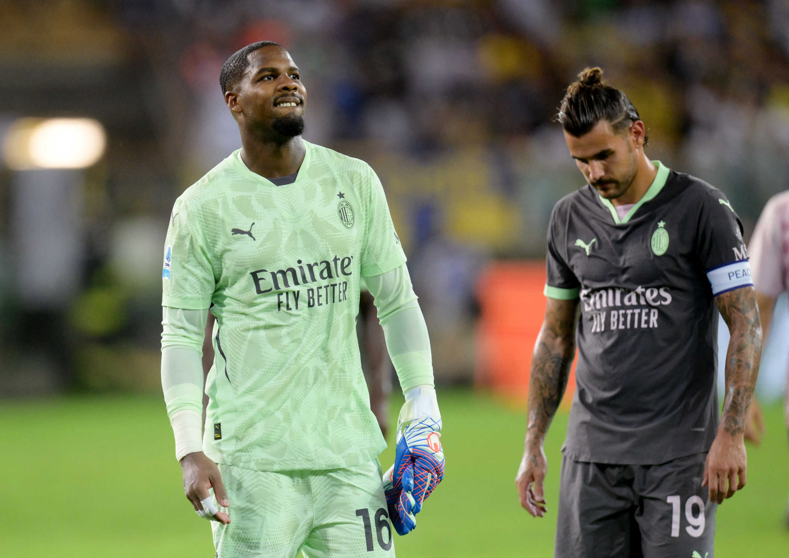 Soccer Football - Serie A - Parma v AC Milan - Stadio Ennio Tardini, Parma, Italy - August 24, 2024 AC Milan's Mike Maignan and Theo Hernandez look dejected after the match REUTERS