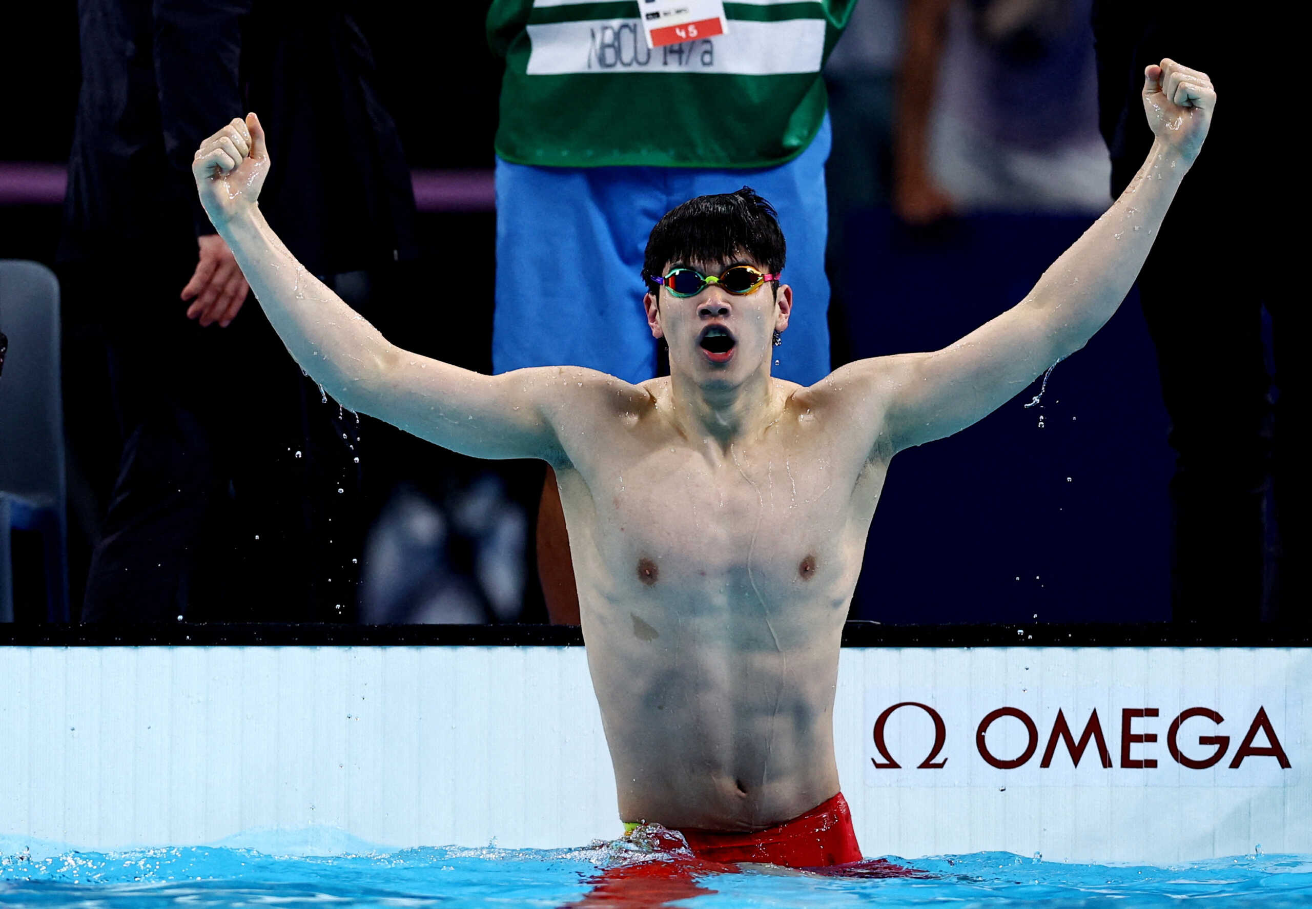 Paris 2024 Olympics - Swimming - Men's 100m Freestyle Final - Paris La Defense Arena, Nanterre, France - July 31, 2024.  Zhanle Pan of China reacts after winning the race and establishing World record. REUTERS