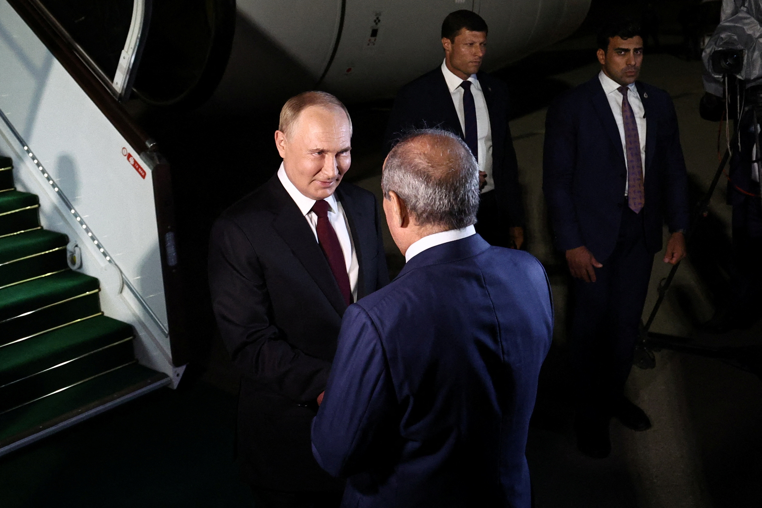 Russian President Vladimir Putin is welcomed upon arrival at the airport in Baku, Azerbaijan August 18, 2024. Sputnik