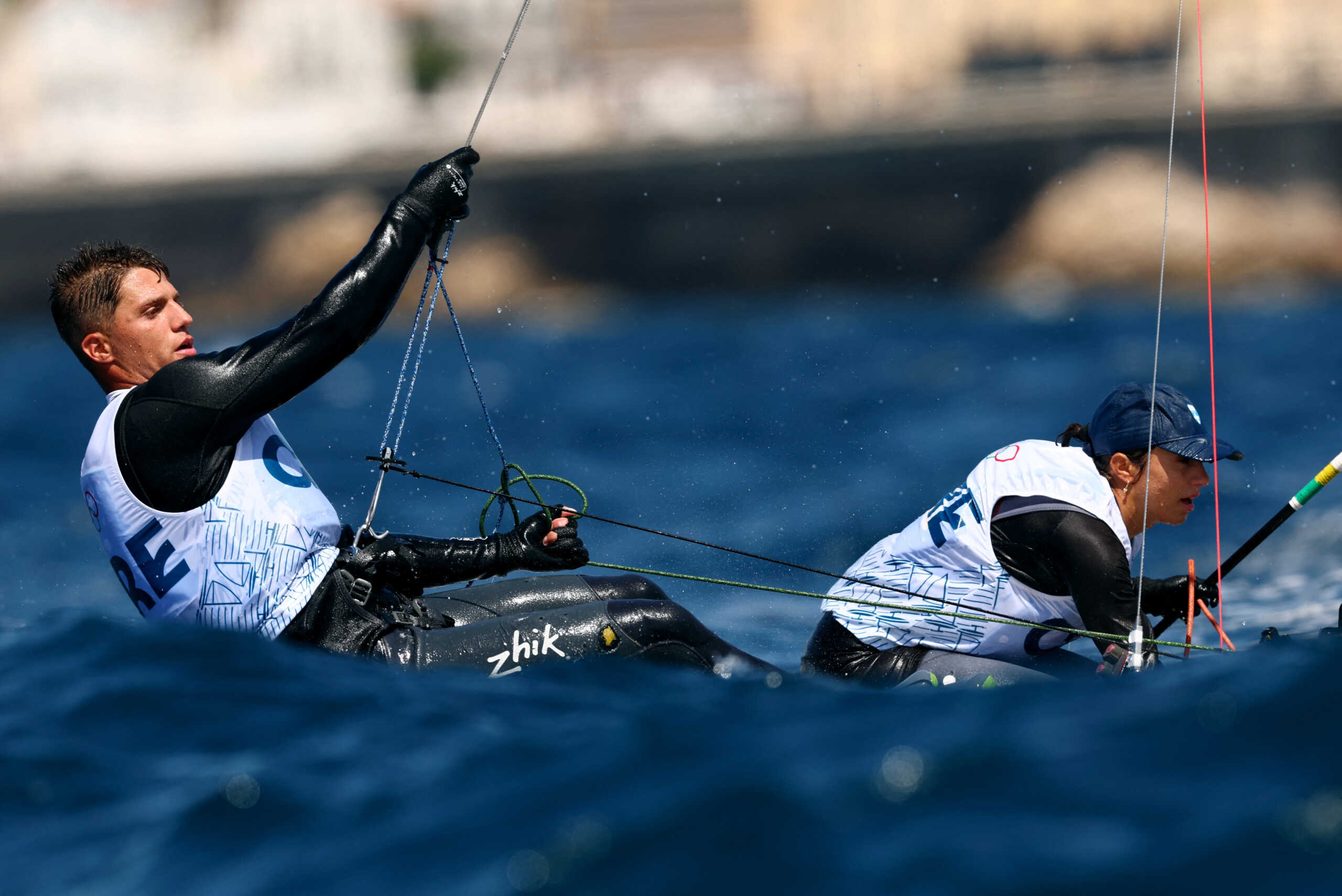 Paris 2024 Olympics - Sailing Training - Marseille Marina, Marseille, France - July 24, 2024. Odysseas Emmanouil Spanakis and Ariadni Paraskevi Spanaki of Greece in action during mixed dinghy training. REUTERS