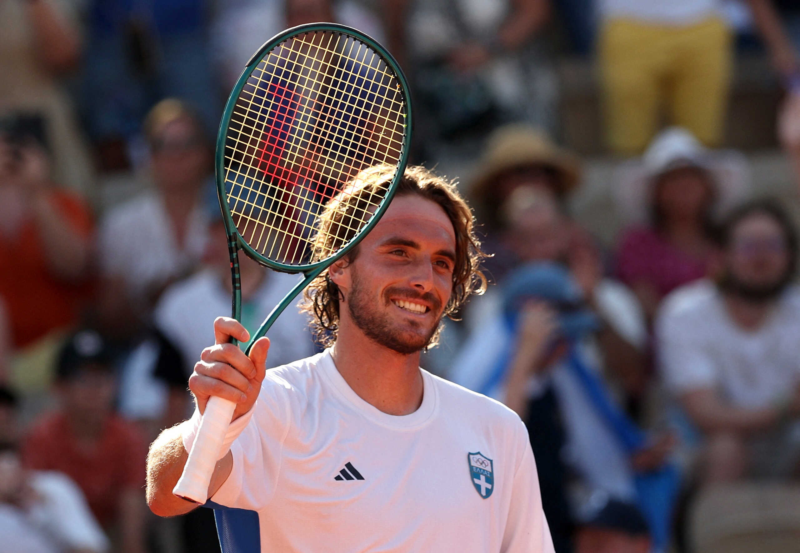 Paris 2024 Olympics - Tennis - Men's Singles Second Round - Roland-Garros Stadium, Paris, France - July 29, 2024. Stefanos Tsitsipas of Greece celebrates after winning his match against Daniel Evans of Britain. REUTERS