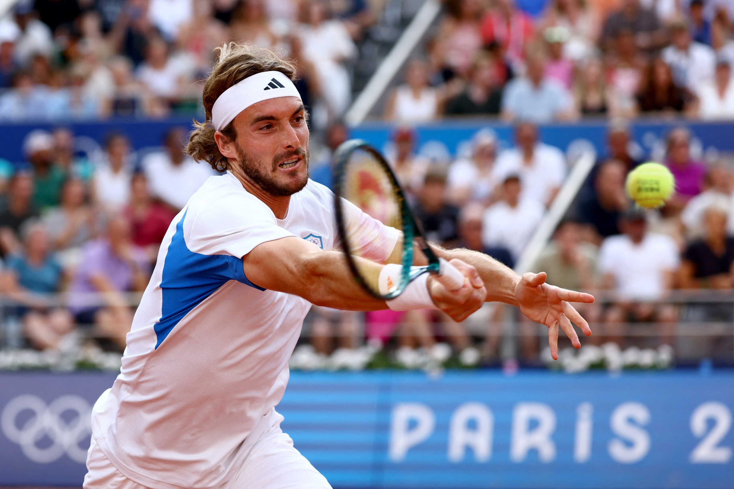 Paris 2024 Olympics - Tennis - Men's Singles Quarterfinals - Roland-Garros Stadium, Paris, France - August 01, 2024. Stefanos Tsitsipas of Greece in action during his match against Novak Djokovic of Serbia. REUTERS