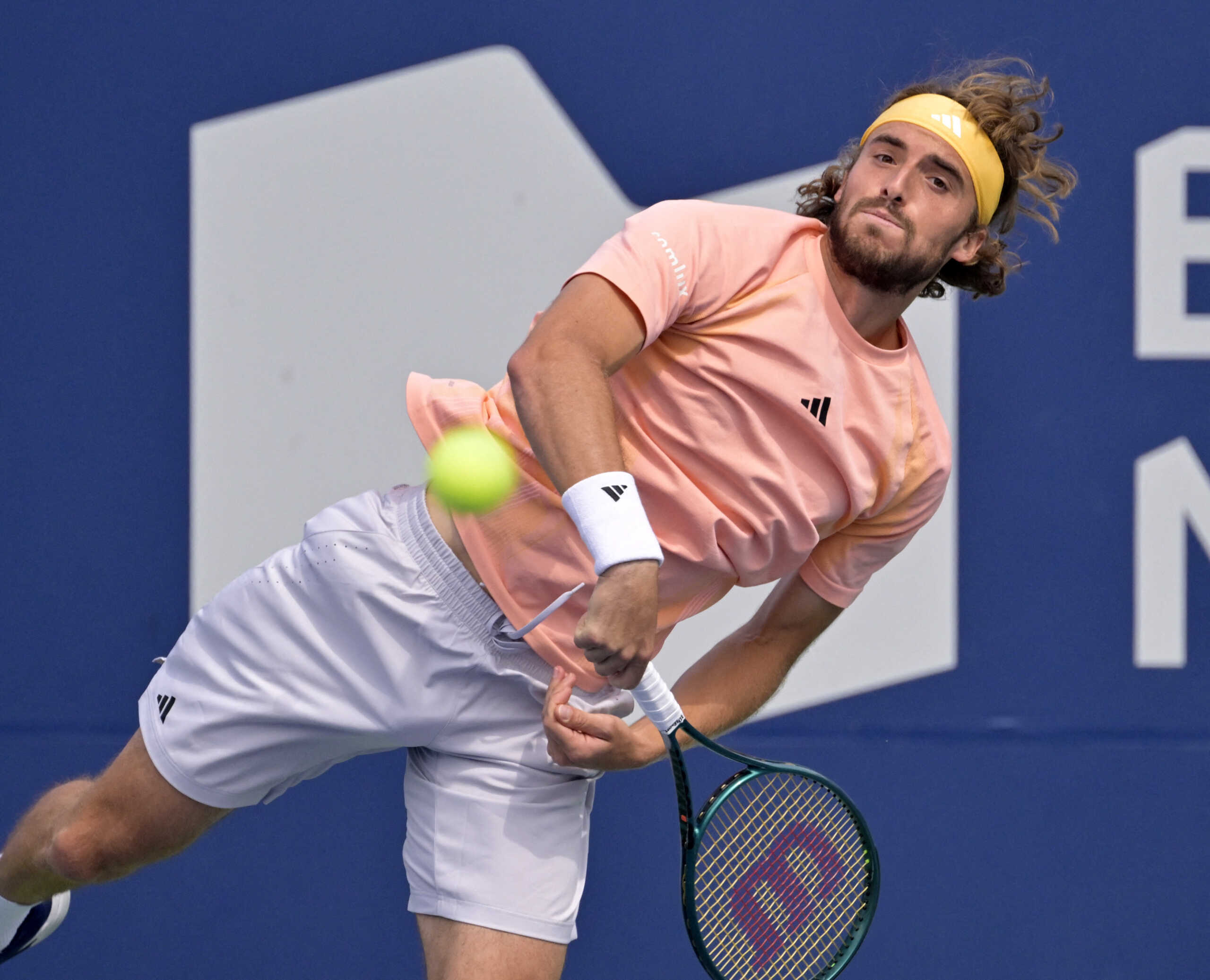 Aug 8, 2024; Montreal, Quebec, Canada; Stefanos Tsitsipas (GRE) serves against Kei Nishikori (JPN) (not pictured) in second round play at IGA Stadium. Mandatory Credit: Eric Bolte-USA TODAY Sports