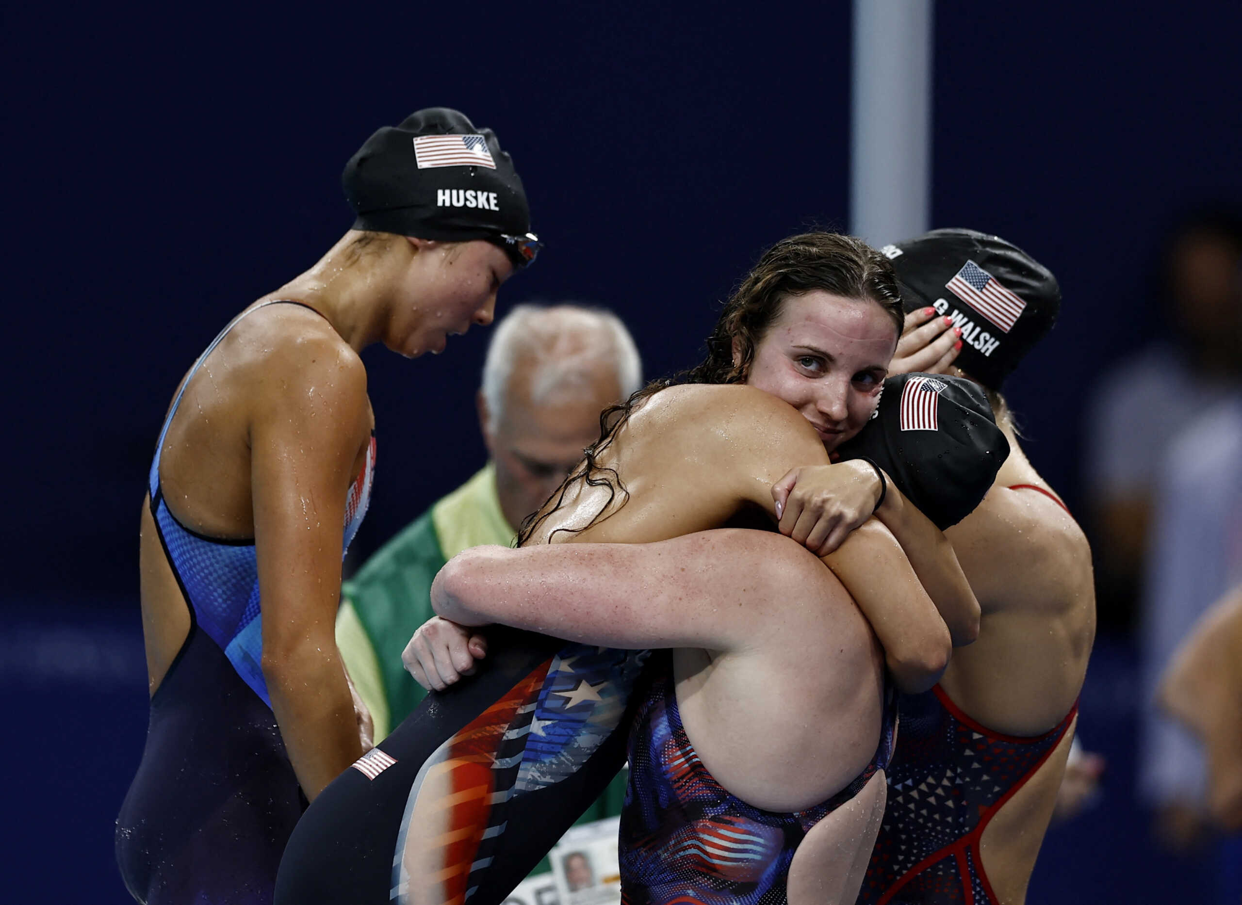 Paris 2024 Olympics - Swimming - Women's 4 x 100m Medley Relay Final - Paris La Defense Arena, Nanterre, France - August 04, 2024. Regan Smith of United States and Lilly King of United States celebrate after winning and establishing a World record. REUTERS