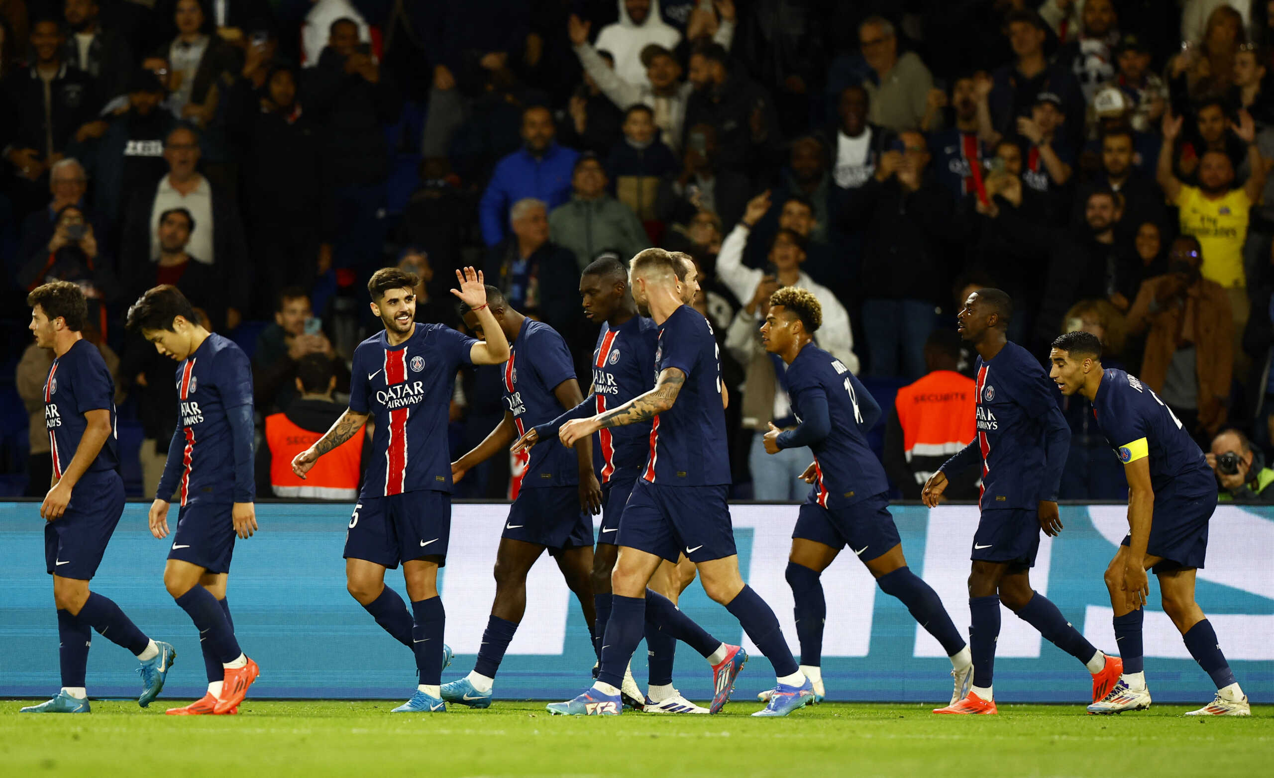 Soccer Football - Ligue 1 - Paris St Germain v Brest - Parc des Princes, Paris, France - September 14, 2024 Paris St Germain's Ousmane Dembele celebrates scoring their third goal with teammates REUTERS