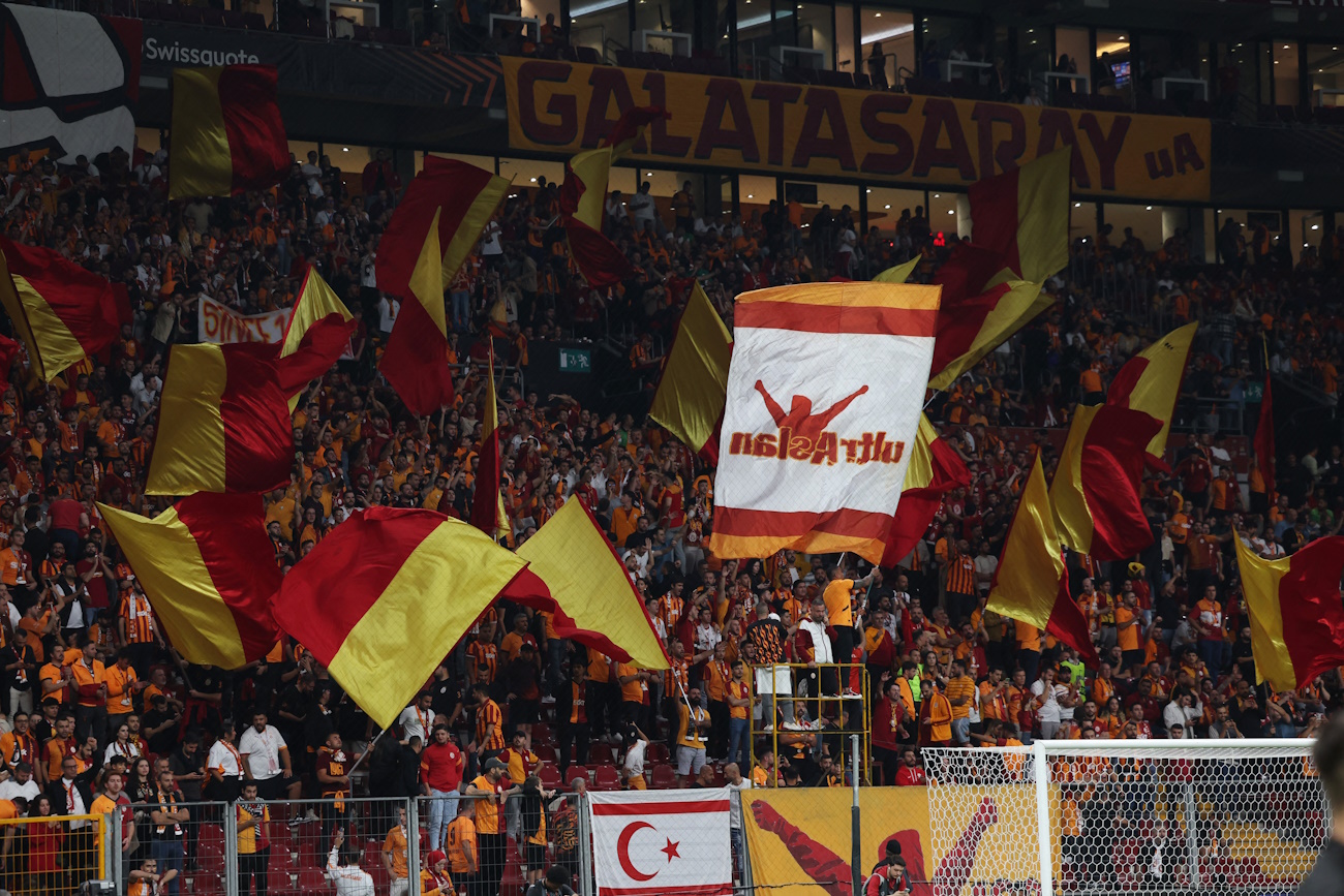 Soccer Football - Europa League - Galatasaray v PAOK - RAMS Park, Istanbul, Turkey - September 25, 2024 Galatasaray fans display flags inside the stadium before the match REUTERS