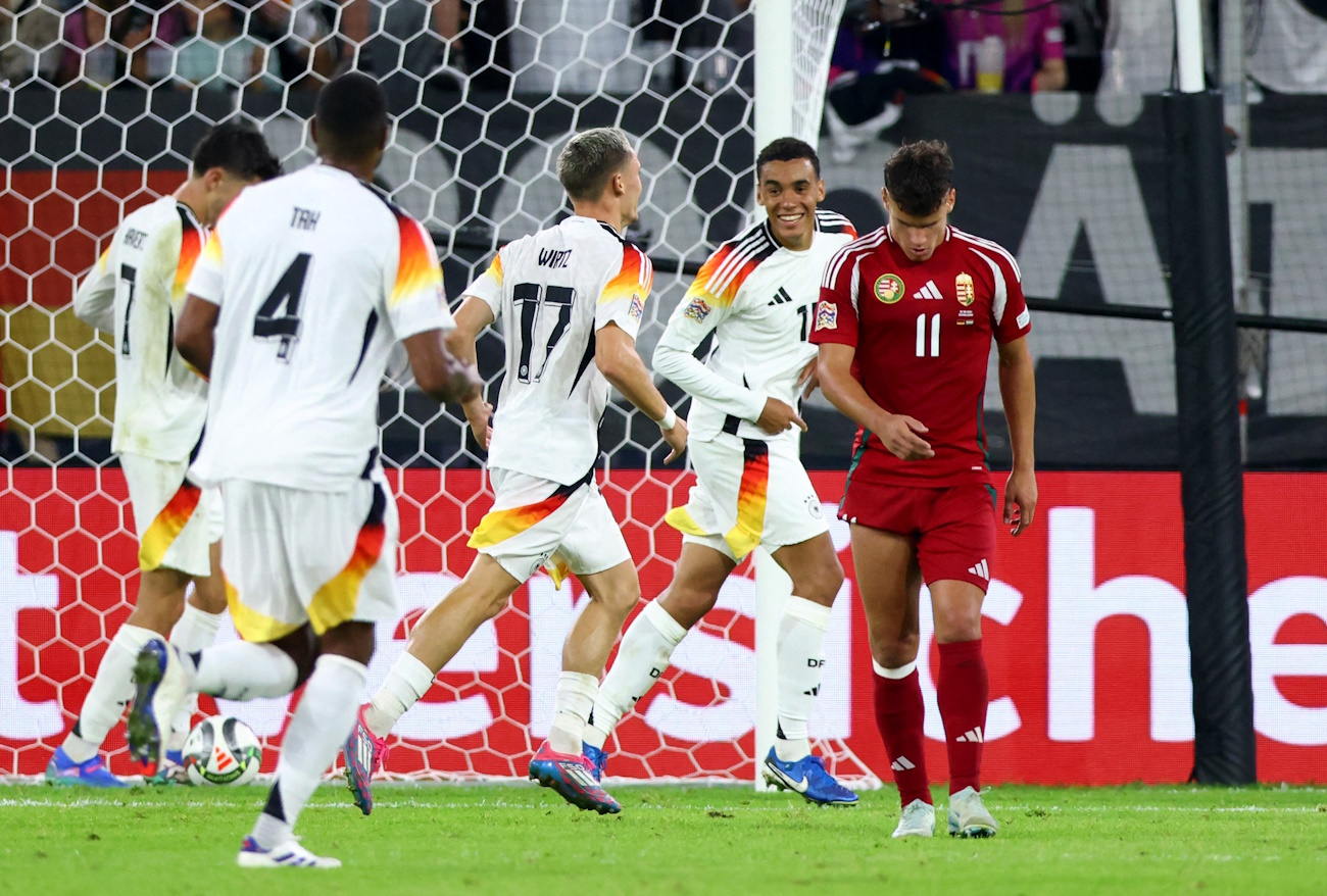 Soccer Football - Nations League - League A - Group 3 - Germany v Hungary - Merkur Spiel-Arena, Duesseldorf, Germany - September 7, 2024 Germany's Florian Wirtz celebrates scoring their third goal with Germany's Jamal Musiala REUTERS