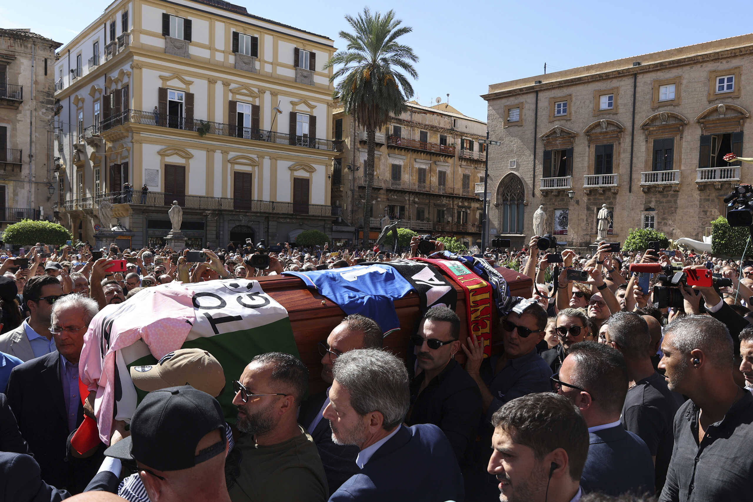 Pallbearers carry the coffin of  Italian World Cup hero Salvatore Toto' Schillaci, during his funeral ceremony at the Palermo cathedral, Italy, Friday, Sept. 20, 2024. (Alberto Lo Bianco