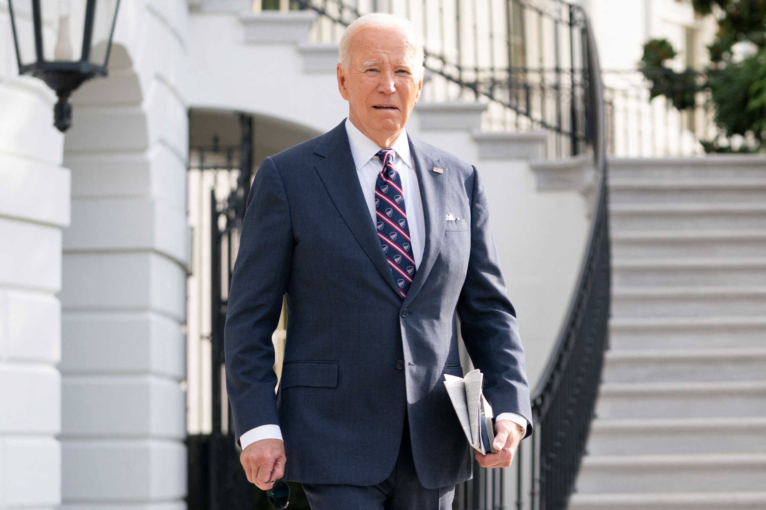 U.S. President Joe Biden speaks with members of the media before boarding Marine One en route to Wilmington, Delaware from the South Lawn of the White House in Washington, U.S., September 16, 2024. REUTERS