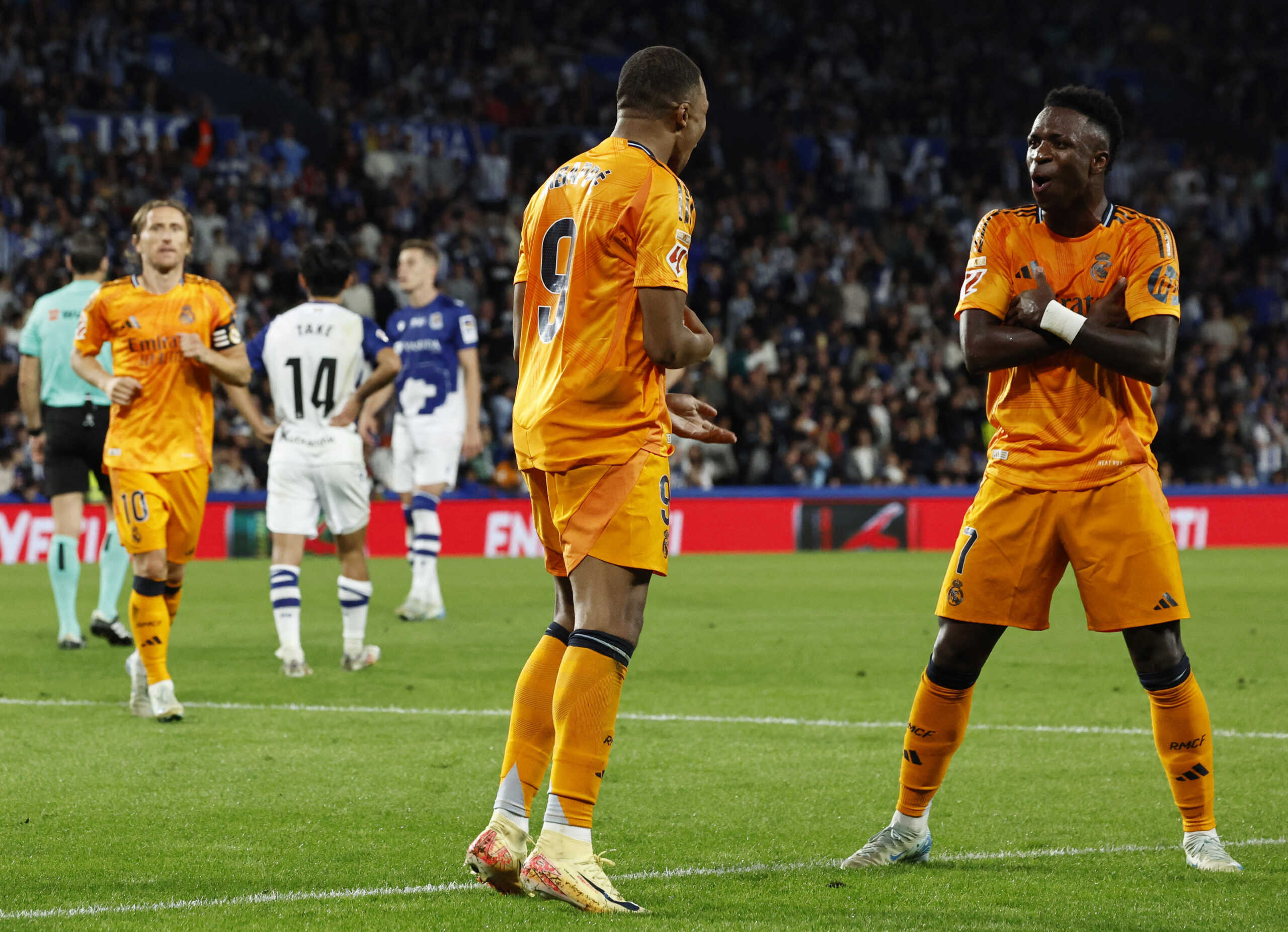 Soccer Football - LaLiga - Real Sociedad v Real Madrid - Reale Arena, San Sebastian, Spain - September 14, 2024 Real Madrid's Kylian Mbappe celebrates scoring their second goal with Vinicius Junior REUTERS