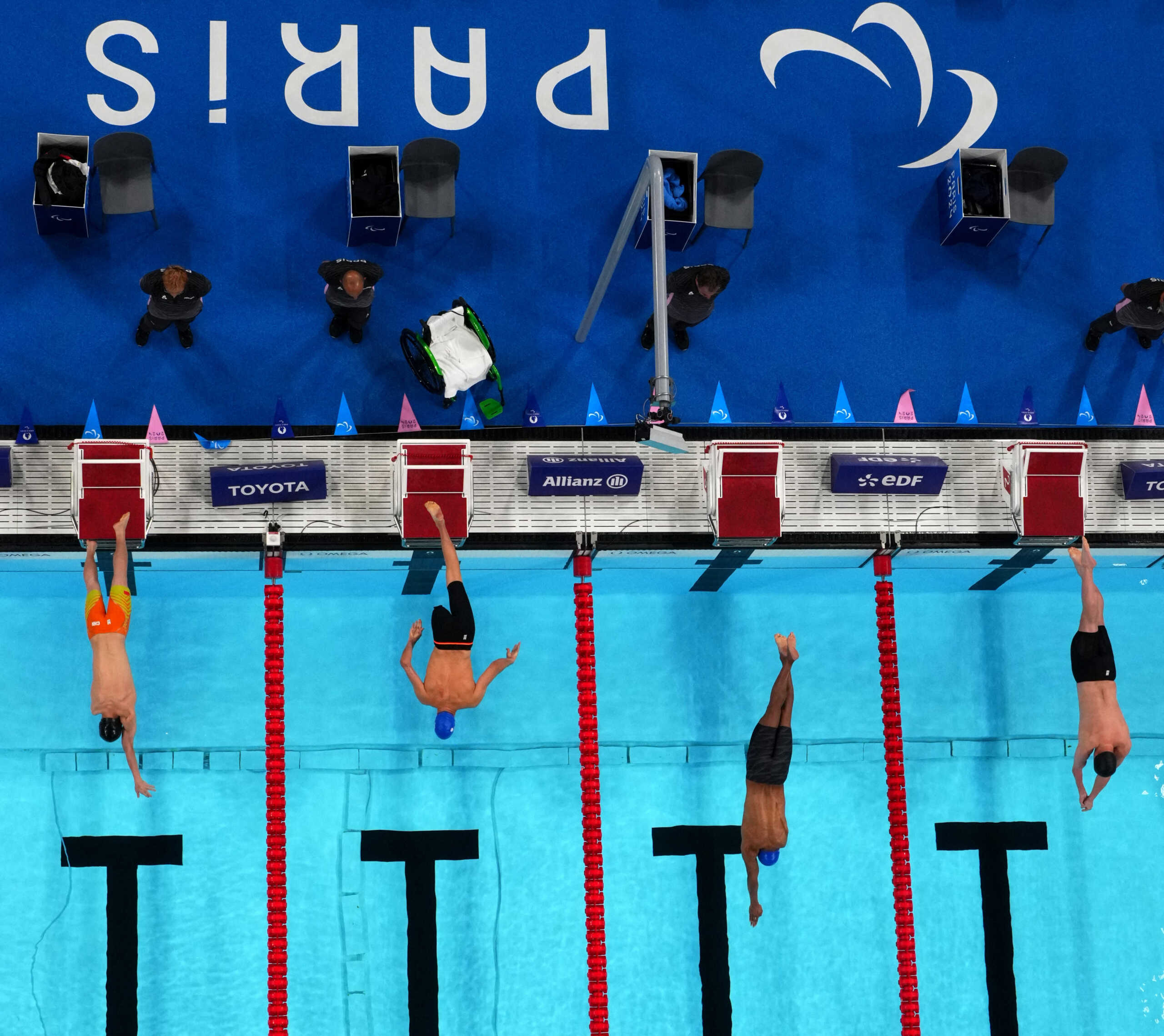 Paris 2024 Paralympics - Swimming - Men's 100m Butterfly - S8 Heats - Paris La Defense Arena, Nanterre, France - September 7, 2024 Ting Li of China, Alberto Amodeo of Italy, Gabriel Cristiano Silva de Souza of Brazil and Dimosthenis Michalentzakis of Greece in action REUTERS