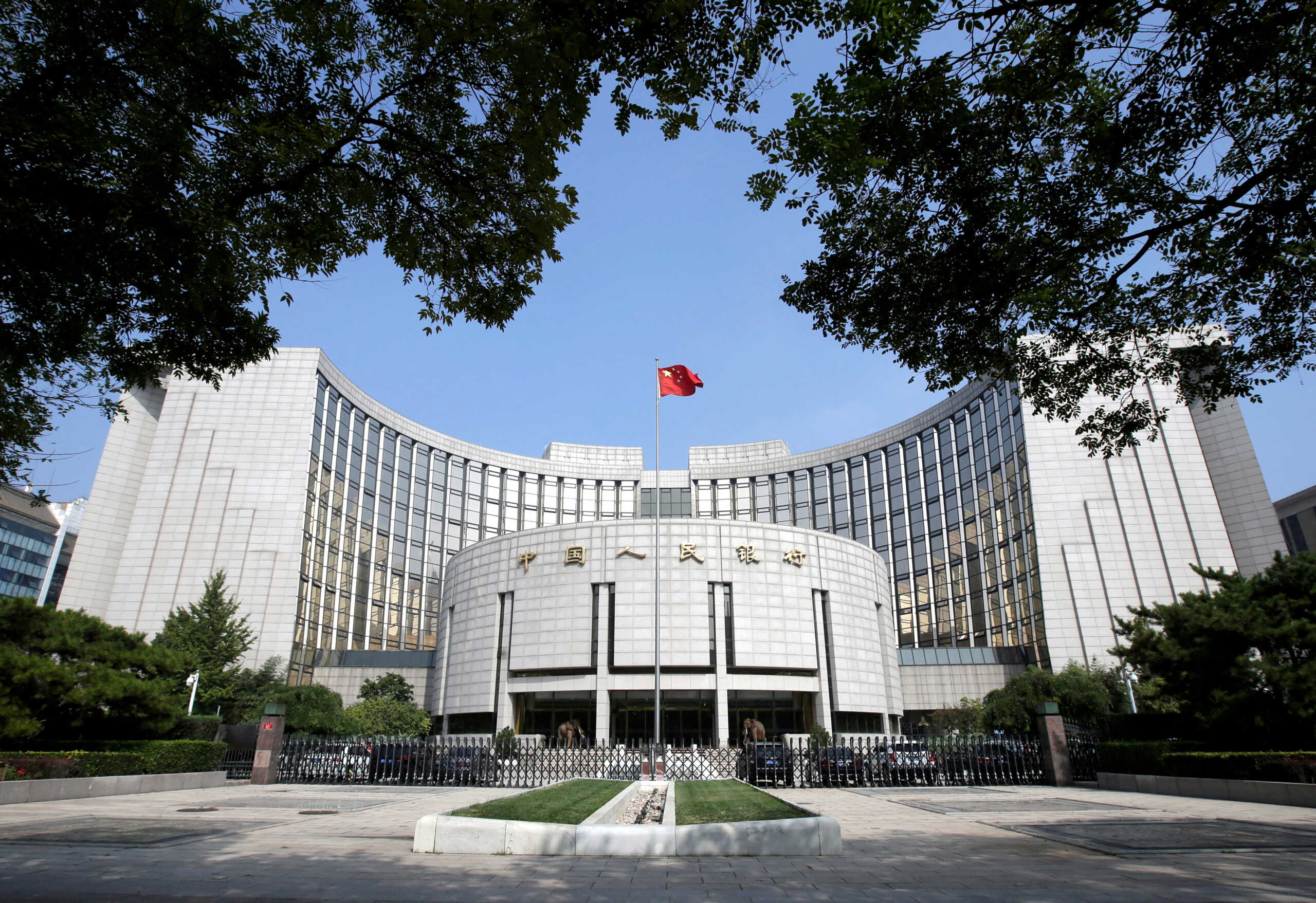 FILE PHOTO: FILE PHOTO: Headquarters of the People's Bank of China (PBOC), the central bank, is pictured in Beijing, China September 28, 2018. REUTERS