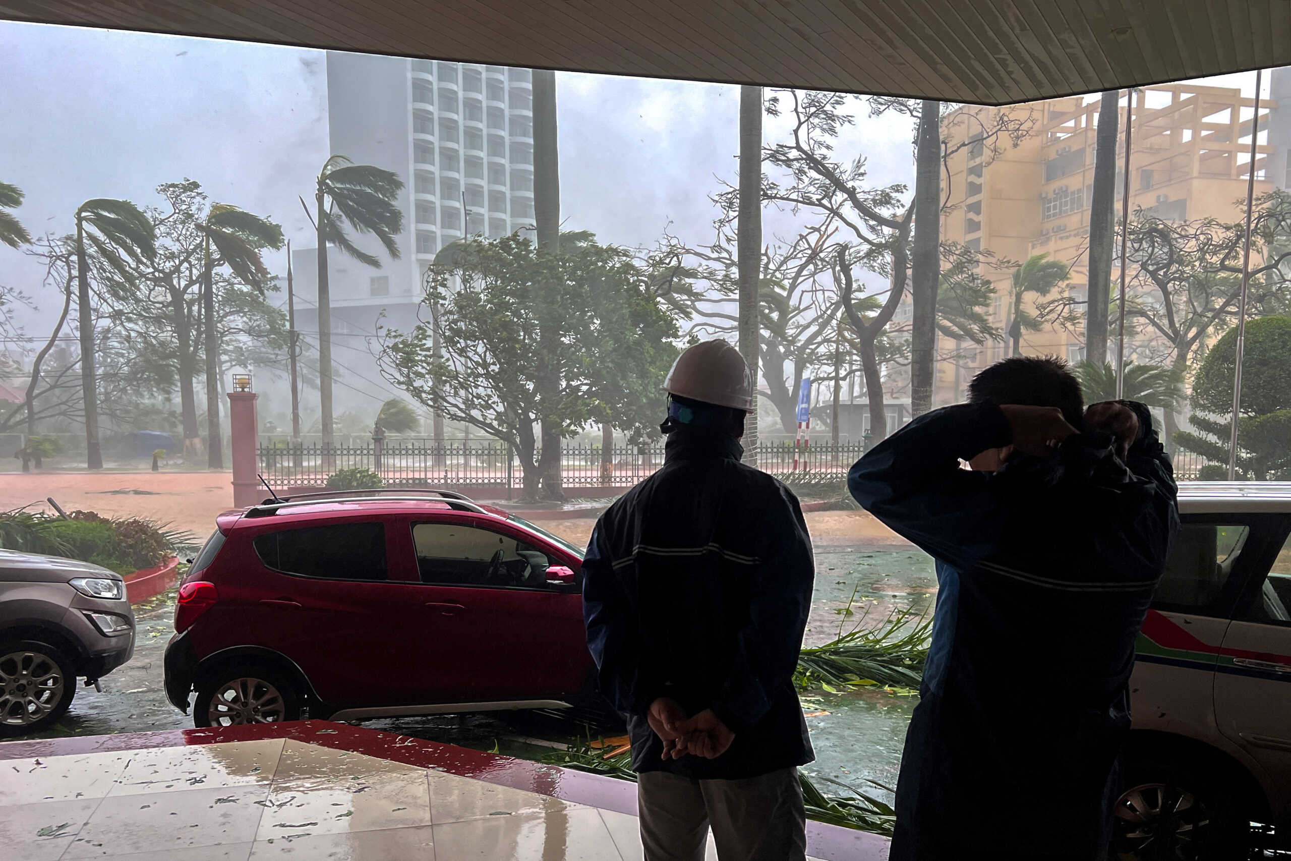 Rescue workers stand due to the impact of Typhoon Yagi, in Do Son district, Hai Phong city, Vietnam, September 7, 2024. REUTERS