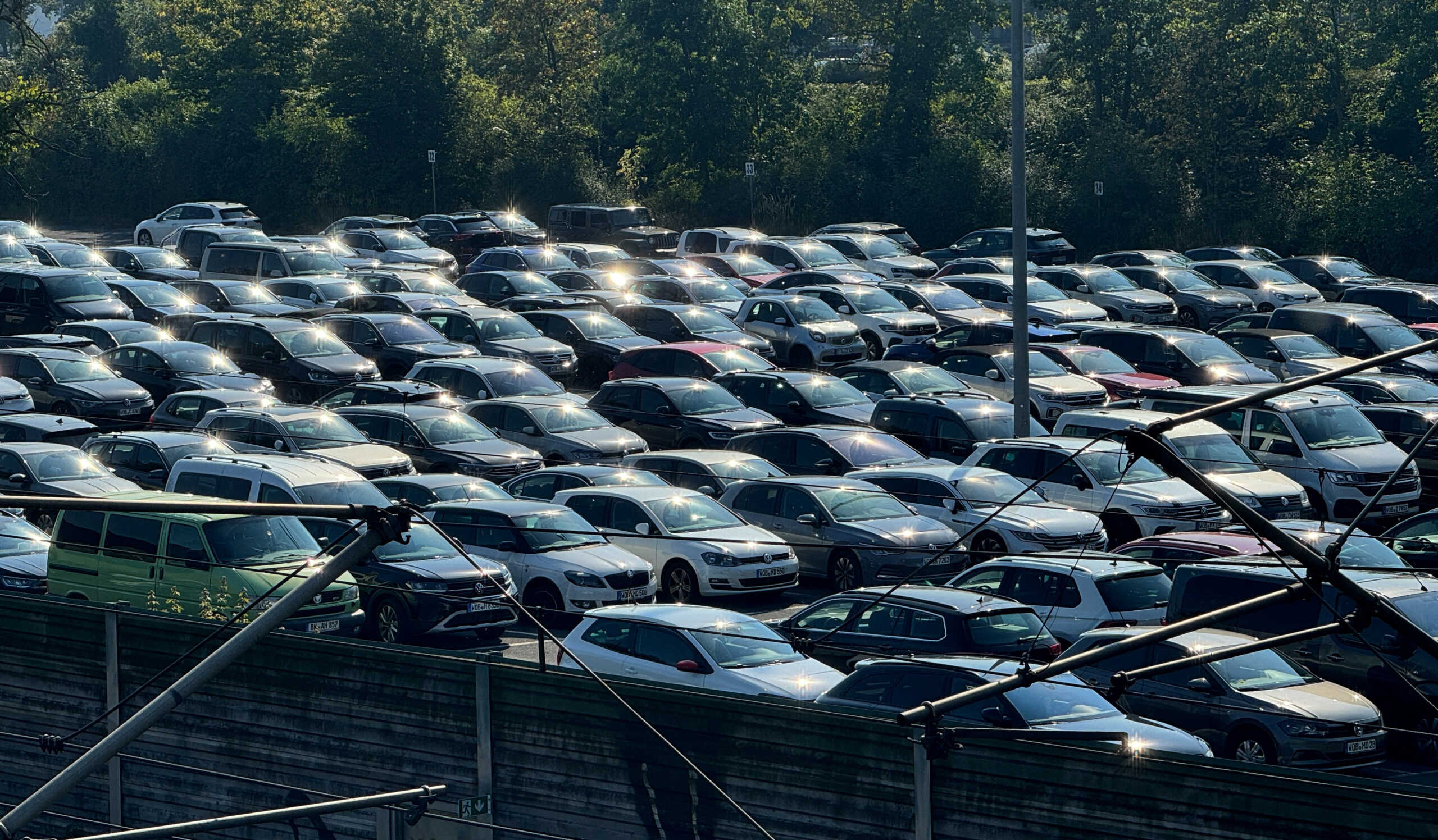 Cars are parked near the power station of the Volkswagen plant, the day when Volkswagen's works council holds a regular meeting with workers in Germany to discuss matters including progress on its cost-cutting drive in Wolfsburg, Germany, September 4, 2024.    REUTERS