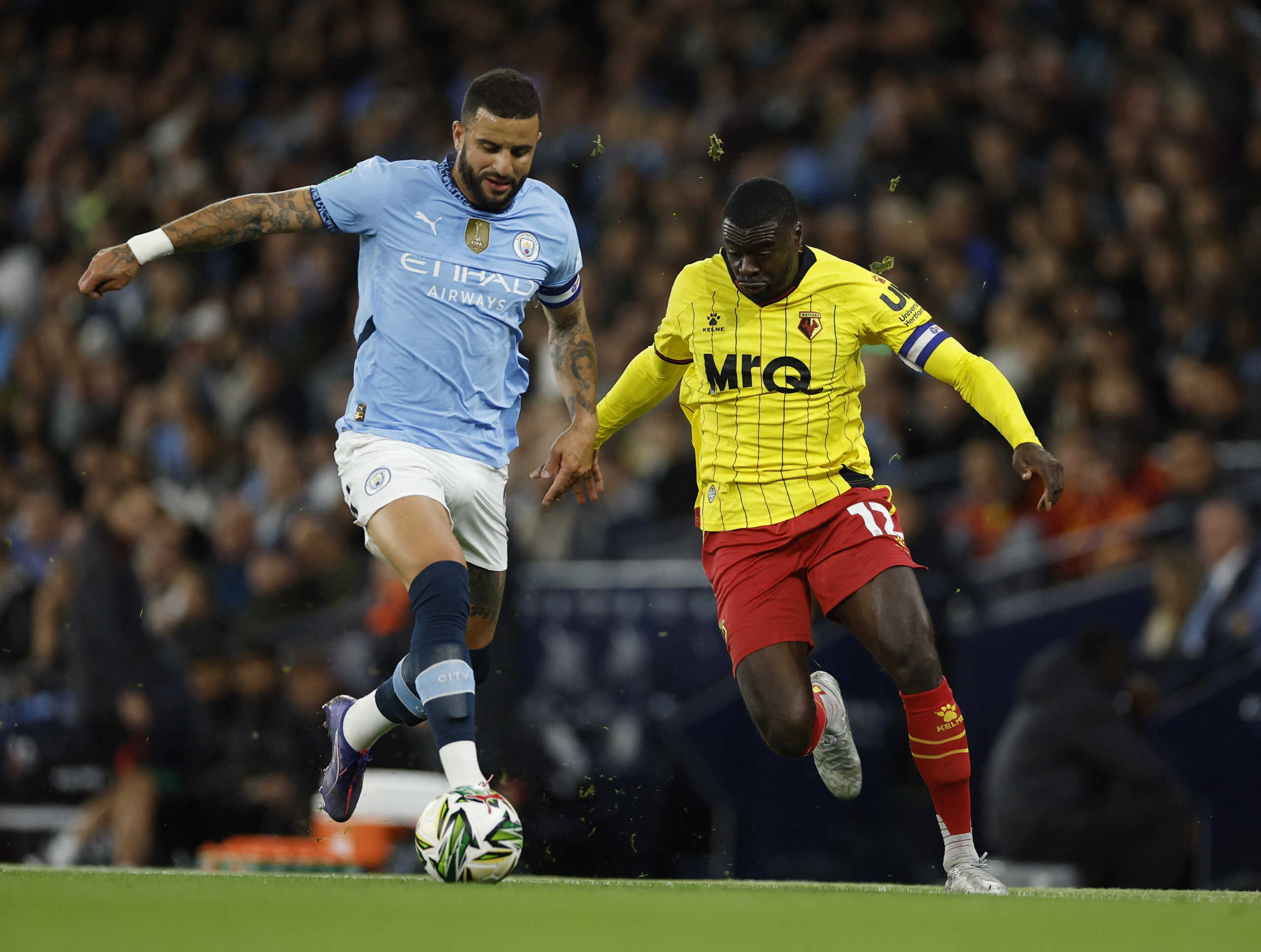 Soccer Football - Carabao Cup - Third Round - Manchester City v Watford - Etihad Stadium, Manchester, Britain - September 24, 2024 Manchester City's Kyle Walker in action with Watford's Ken Sema Action Images via Reuters