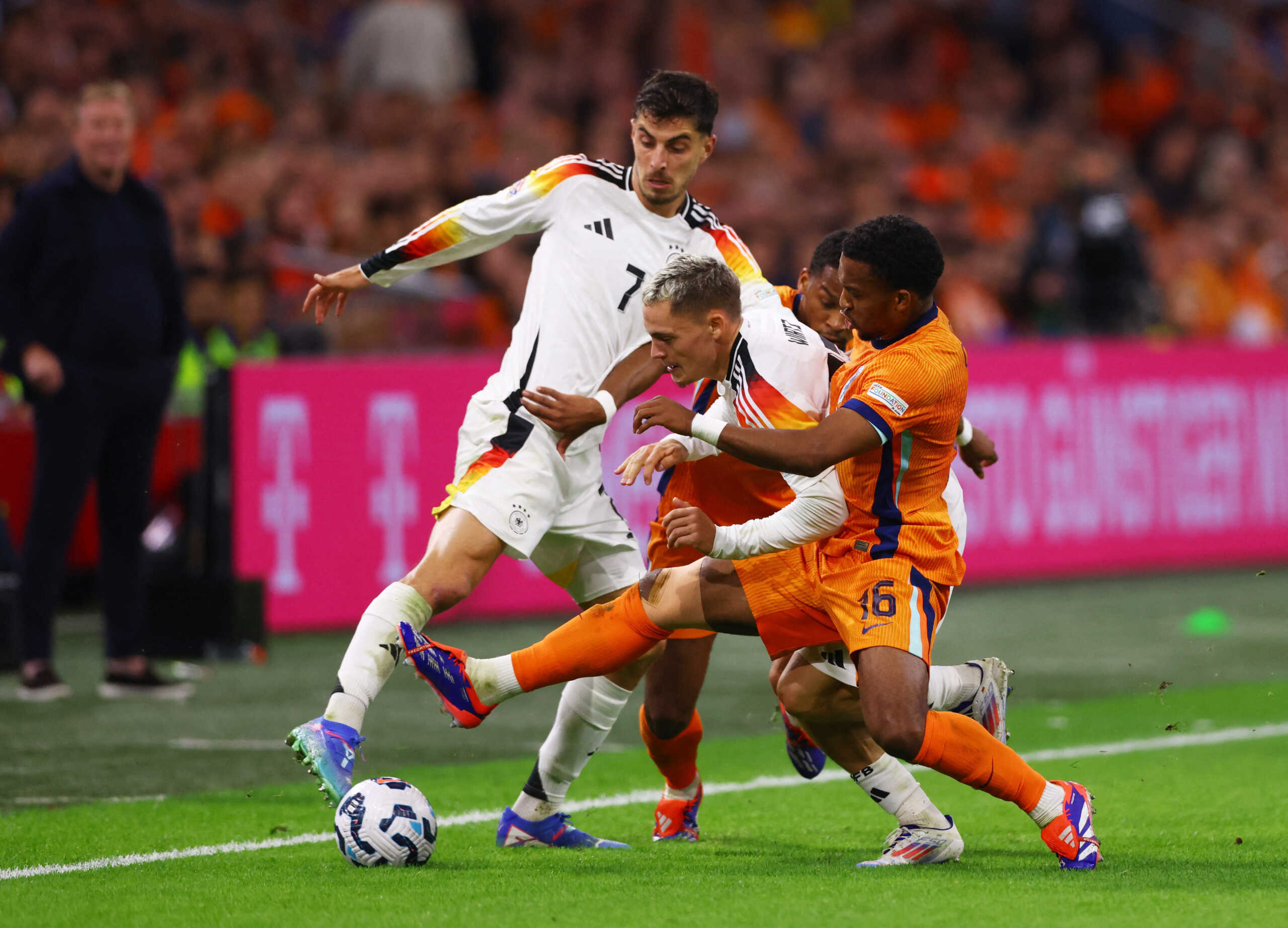 Soccer Football - Nations League - League A - Group 3 - Netherlands v Germany - Johan Cruyff Arena, Amsterdam, Netherlands - September 10, 2024 Netherlands' Quinten Timber and Jurrien Timber in action with Germany's Florian Wirtz and Kai Havertz REUTERS