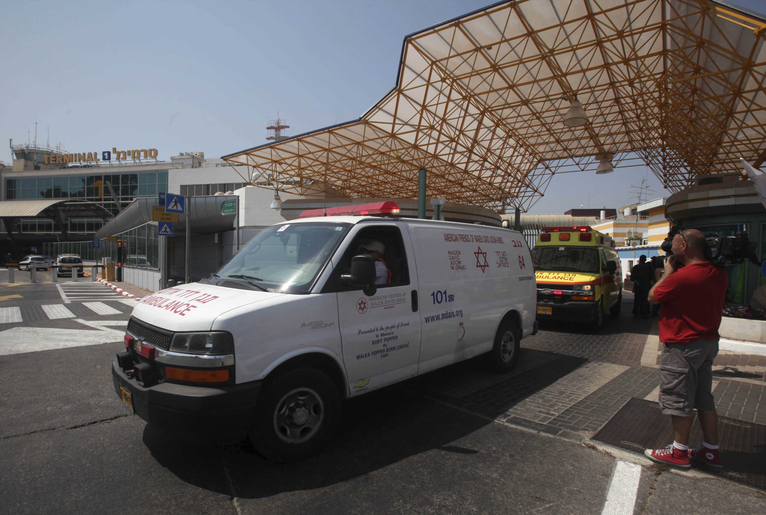 An Israeli ambulance carrying wounded people from a bombing in Bulgaria that killed seven people on Wednesday, July 18, 2012 leaves Ben Gurion airport in Tel Aviv, Israel, Thursday, July, 19, 2012. The bombing was the latest in a series of attacks attributed to Iran that have targeted Israelis and Jews overseas and threatened to escalate a shadow war between the two arch-enemies. (AP Photo