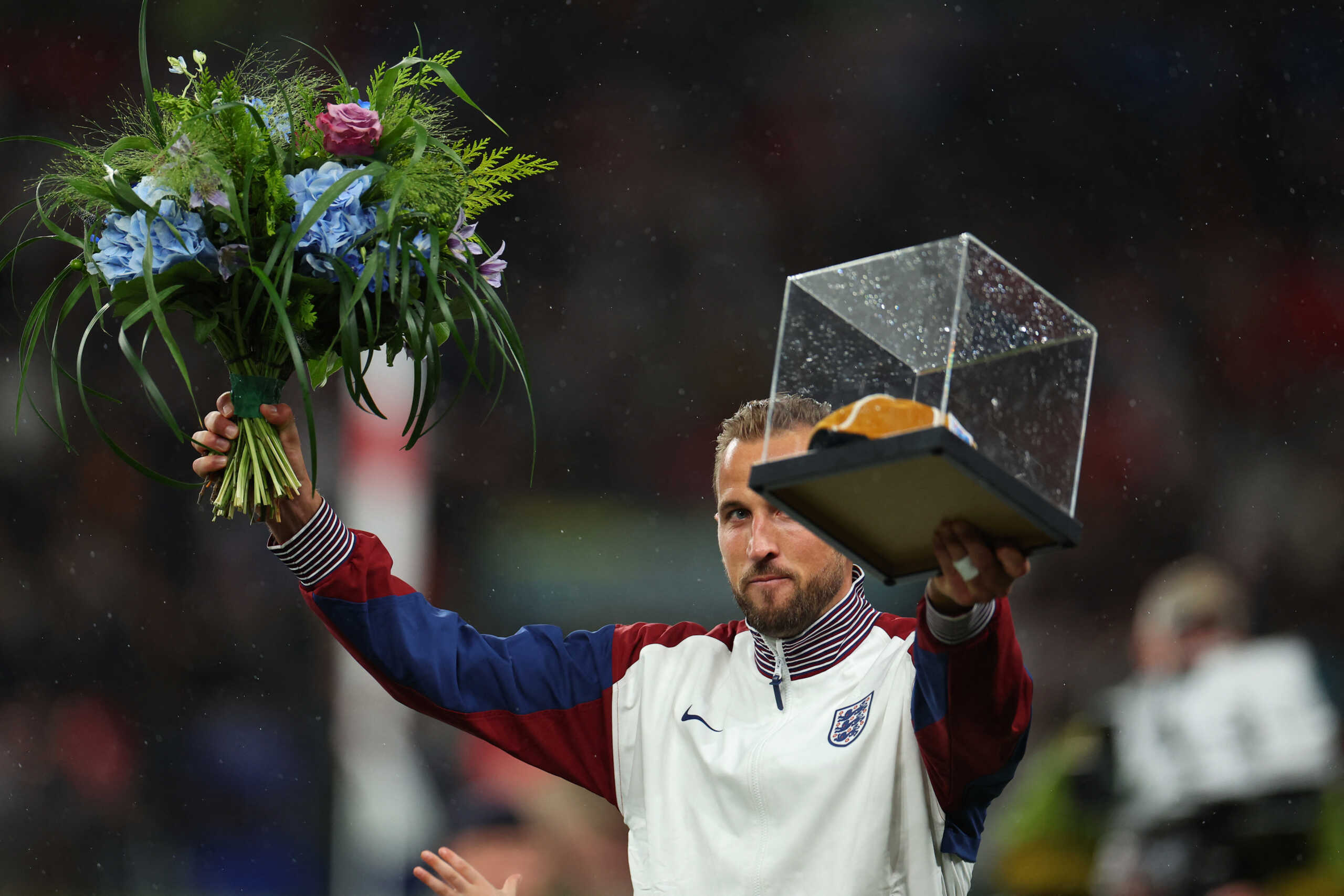 Soccer Football - Nations League - League B - Group 2 - England v Finland - Wembley Stadium, London, Britain - September 10, 2024 England's Harry Kane hold up a golden cap awarded for his 100th England cap before the match REUTERS