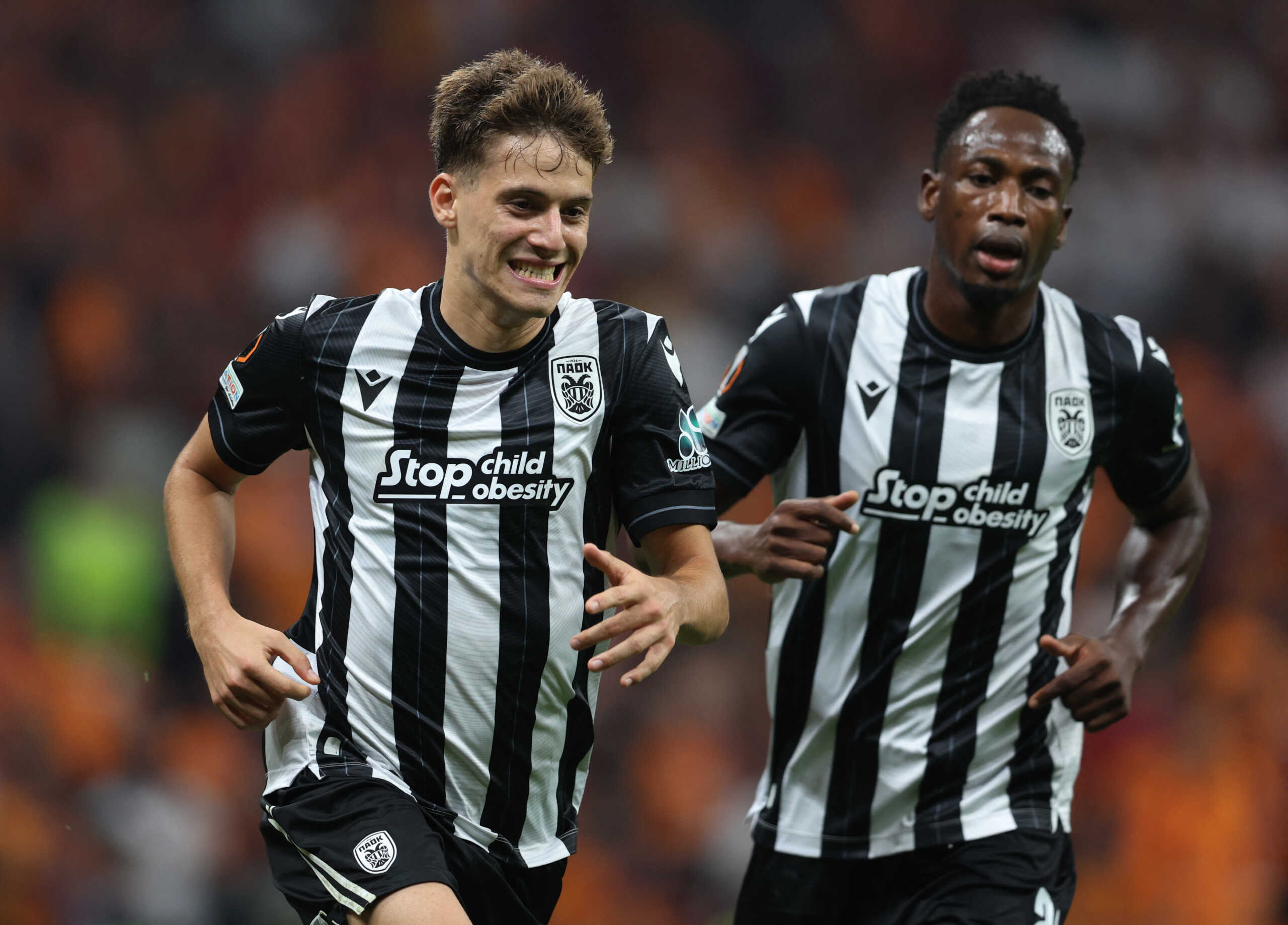 Soccer Football - Europa League - Galatasaray v PAOK - RAMS Park, Istanbul, Turkey - September 25, 2024 PAOK's Giannis Konstantelias celebrates scoring their first goal with PAOK's Abdul Rahman Baba REUTERS