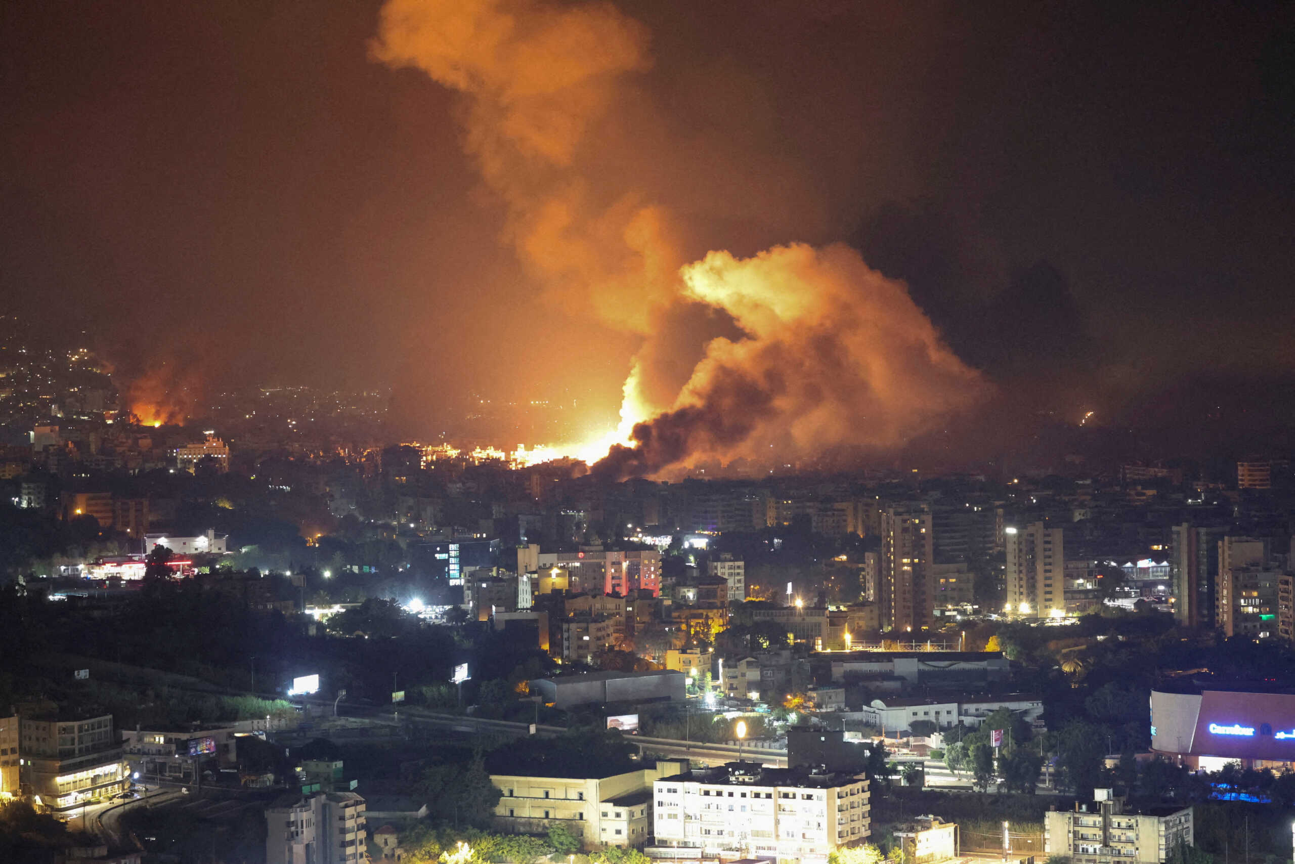 Smoke billows following Israeli strikes over Beirut's southern suburbs, amid ongoing hostilities between Hezbollah and Israeli forces, as seen from Sin El Fil, Lebanon, September 28, 2024. REUTERS